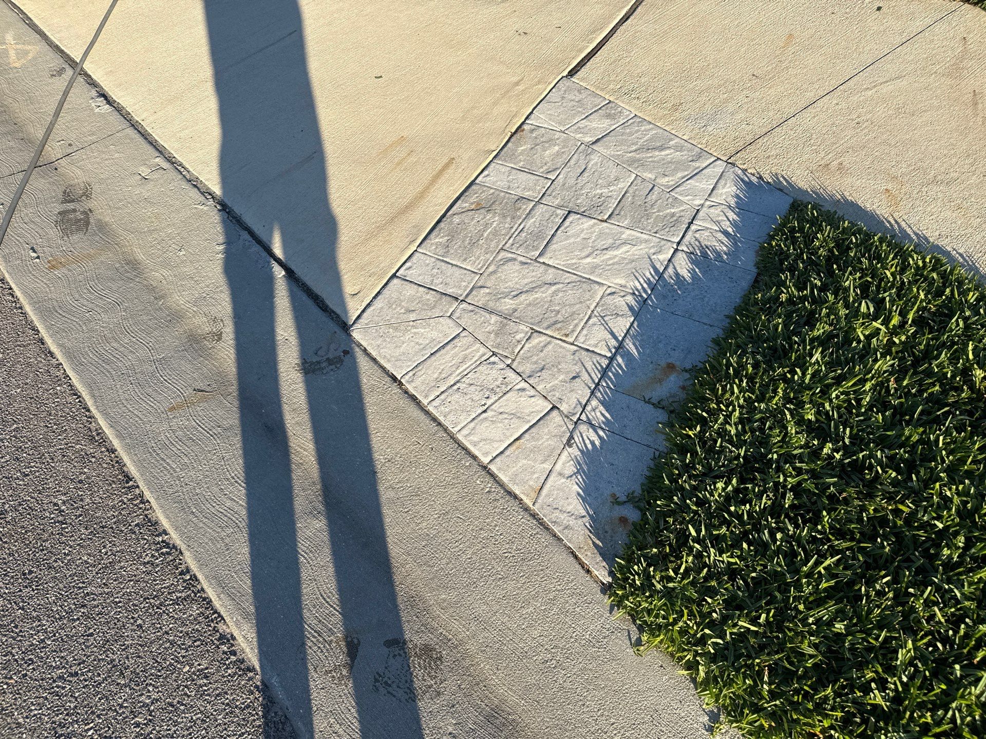 Rust Stain Removal from Concrete Driveway and Pavers in Park East at Azario | Lakewood Ranch, FL by Sunshine AquaWash