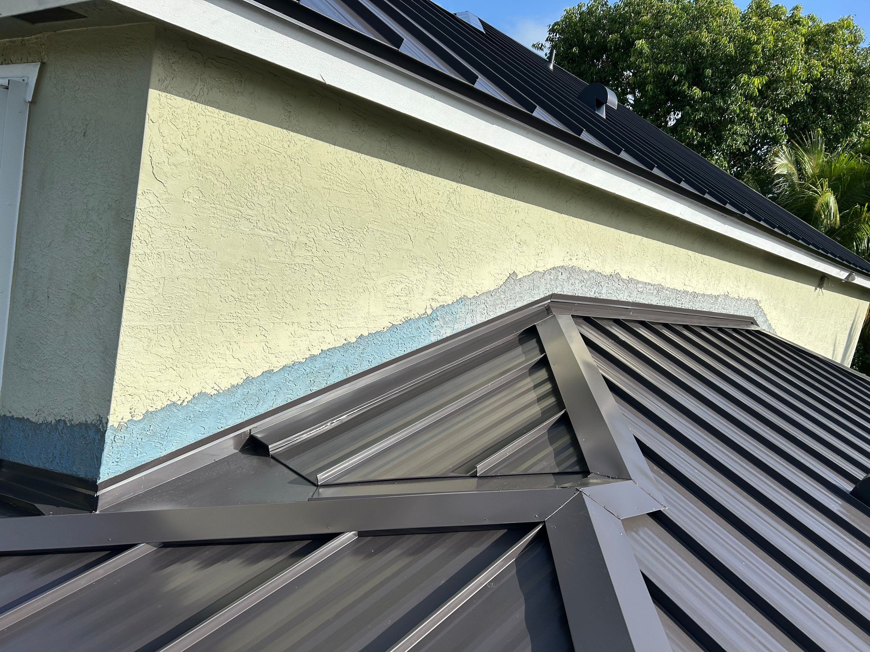 24ga 1.5" Mechanical Seam Dark Bronze by Total Roofing System The Metal Roof Experts