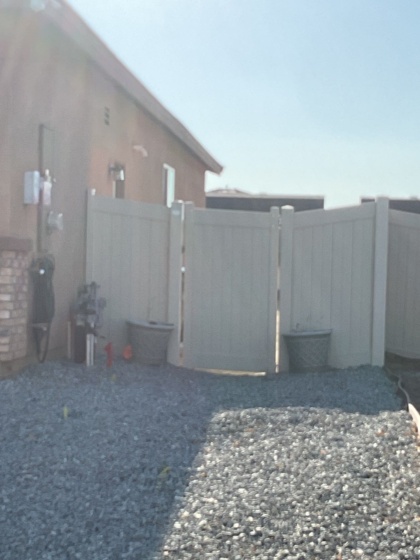 Gate installation using Vinyl by Fence Guys Inc. 