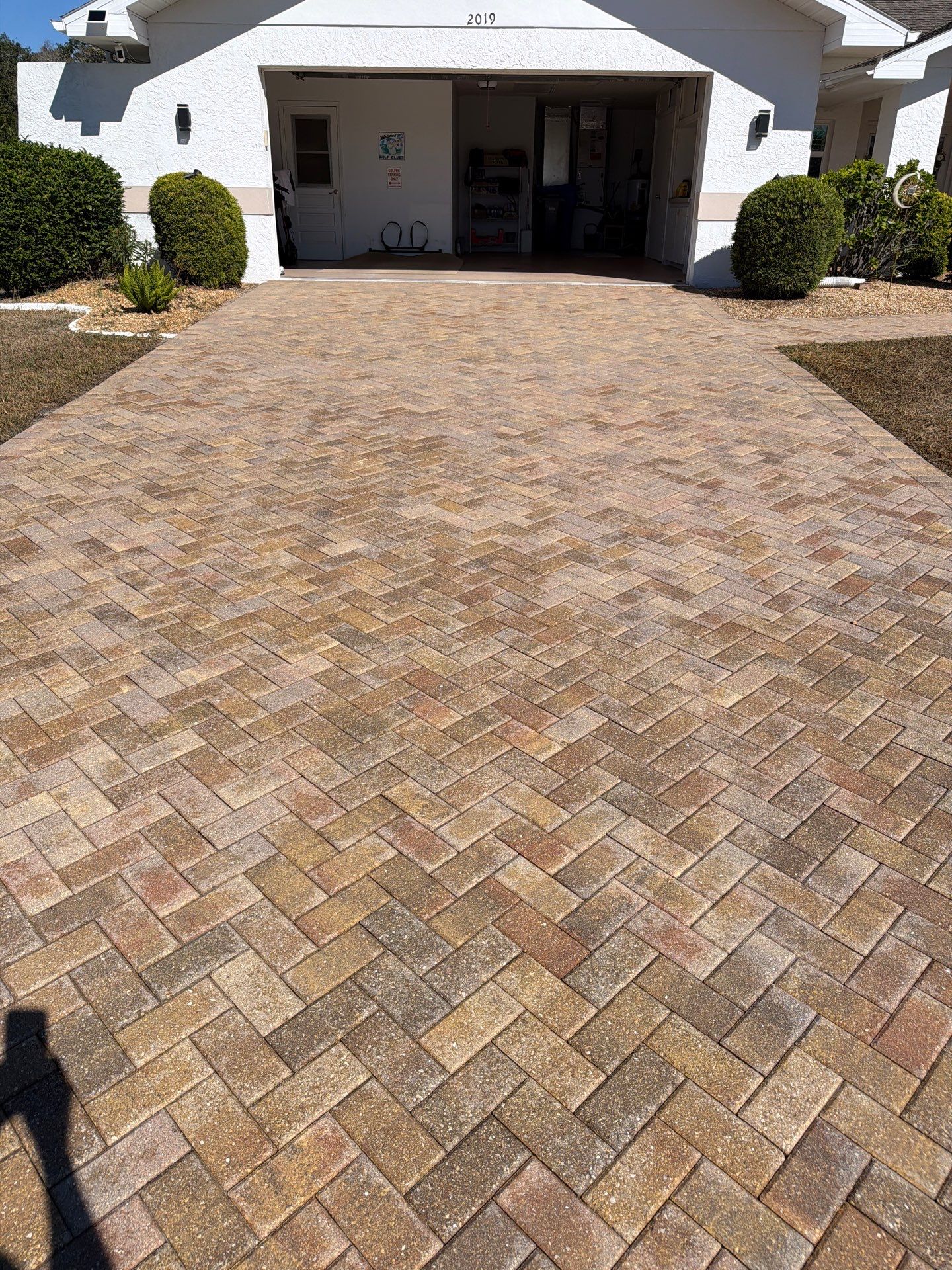 Restoring Herringbone Paver Driveway and Walkway in Sun City Center by Supreme Paver Experts