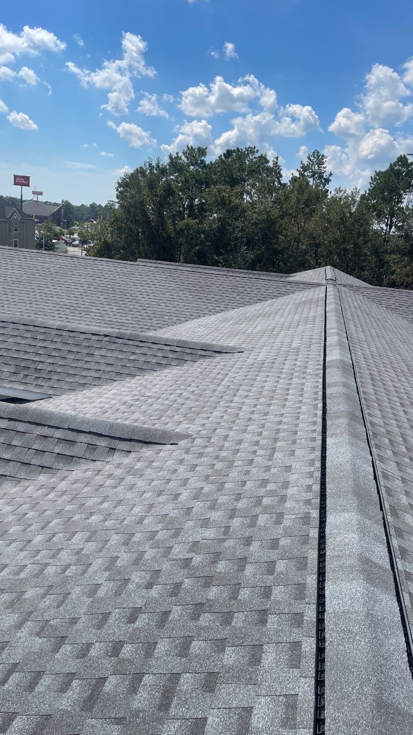 Commercial Roofing Installation using Roof Replacement by American Roofing & Construction LLC