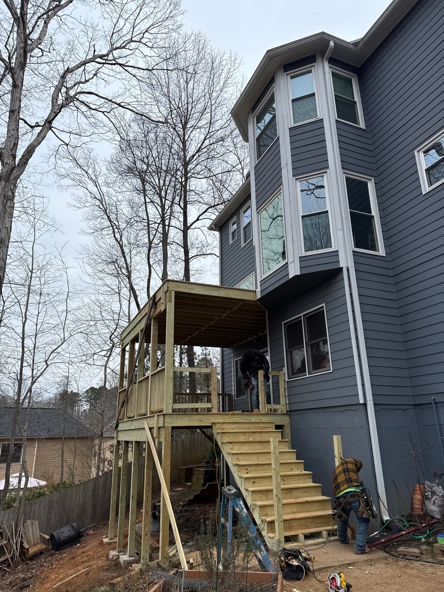 Two-Story Pressure-Treated Wood Deck Installation in Acworth, Georgia by Swift Home Renovations