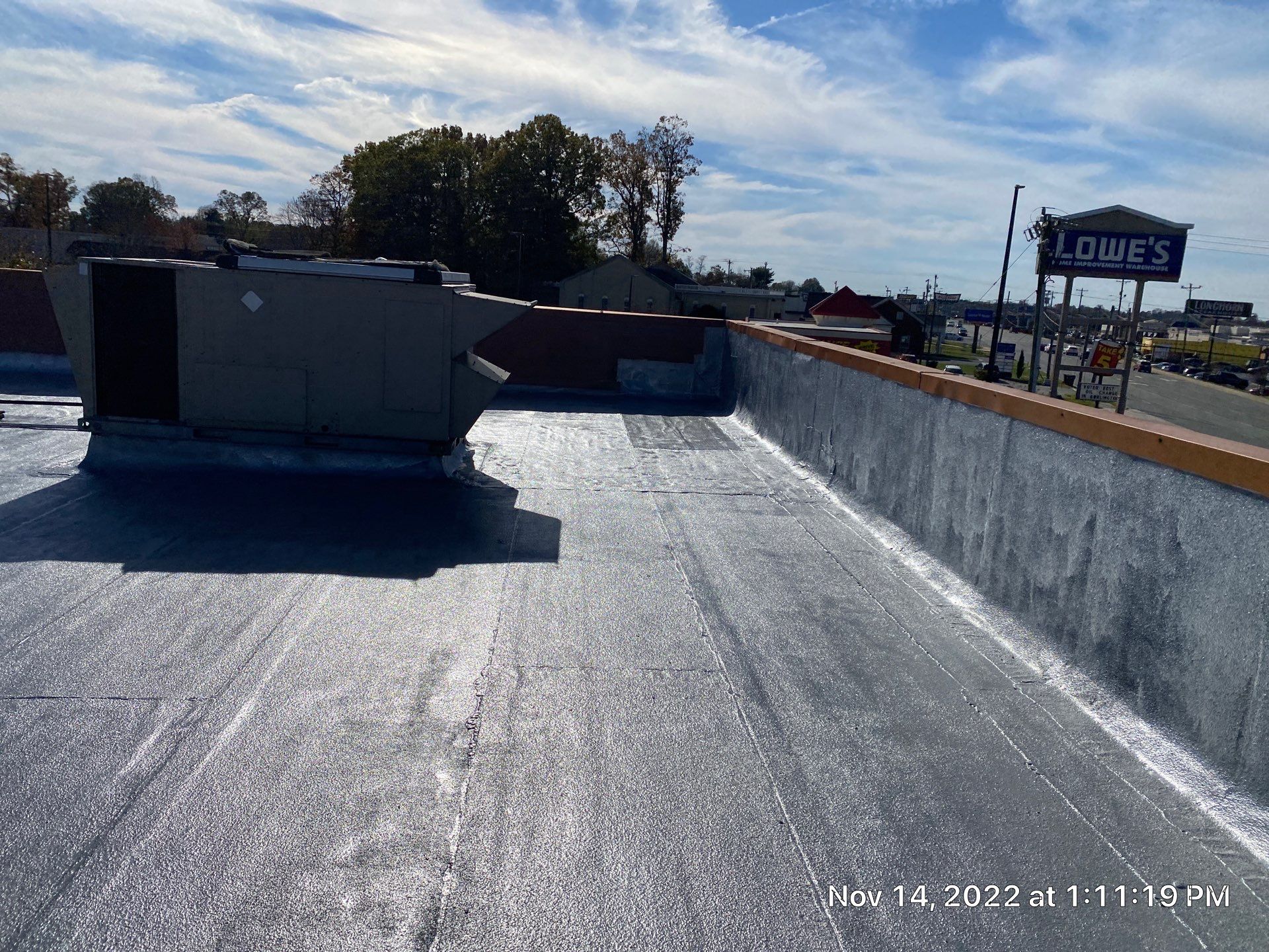 Commercial Coating using Poly Urerthane and Silicone Coating by Just In Time Roofing and Restoration