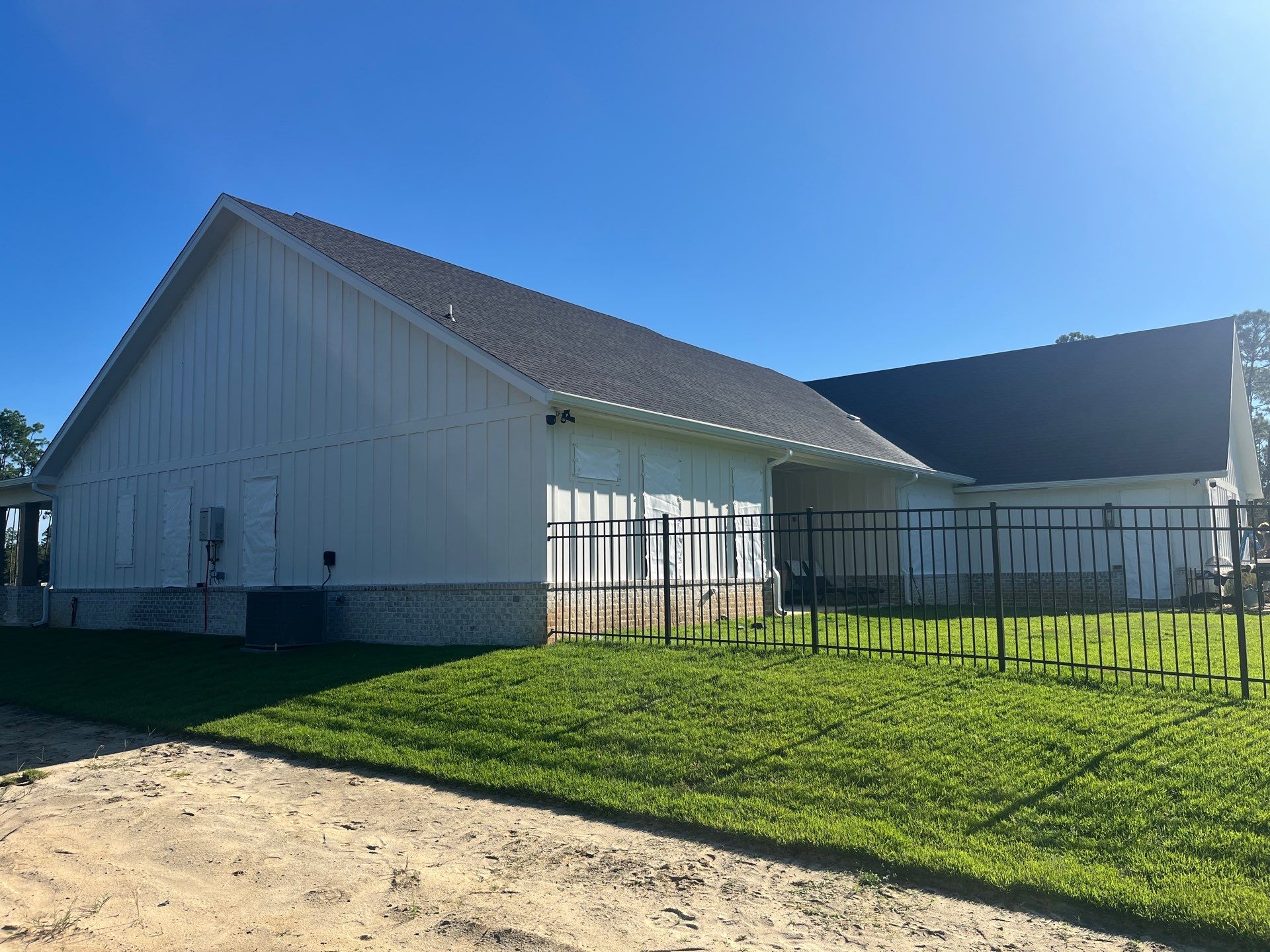 Custom Hurricane Fabric Storm Shutter Installation in Panama City by Brannan Aluminum Inc.