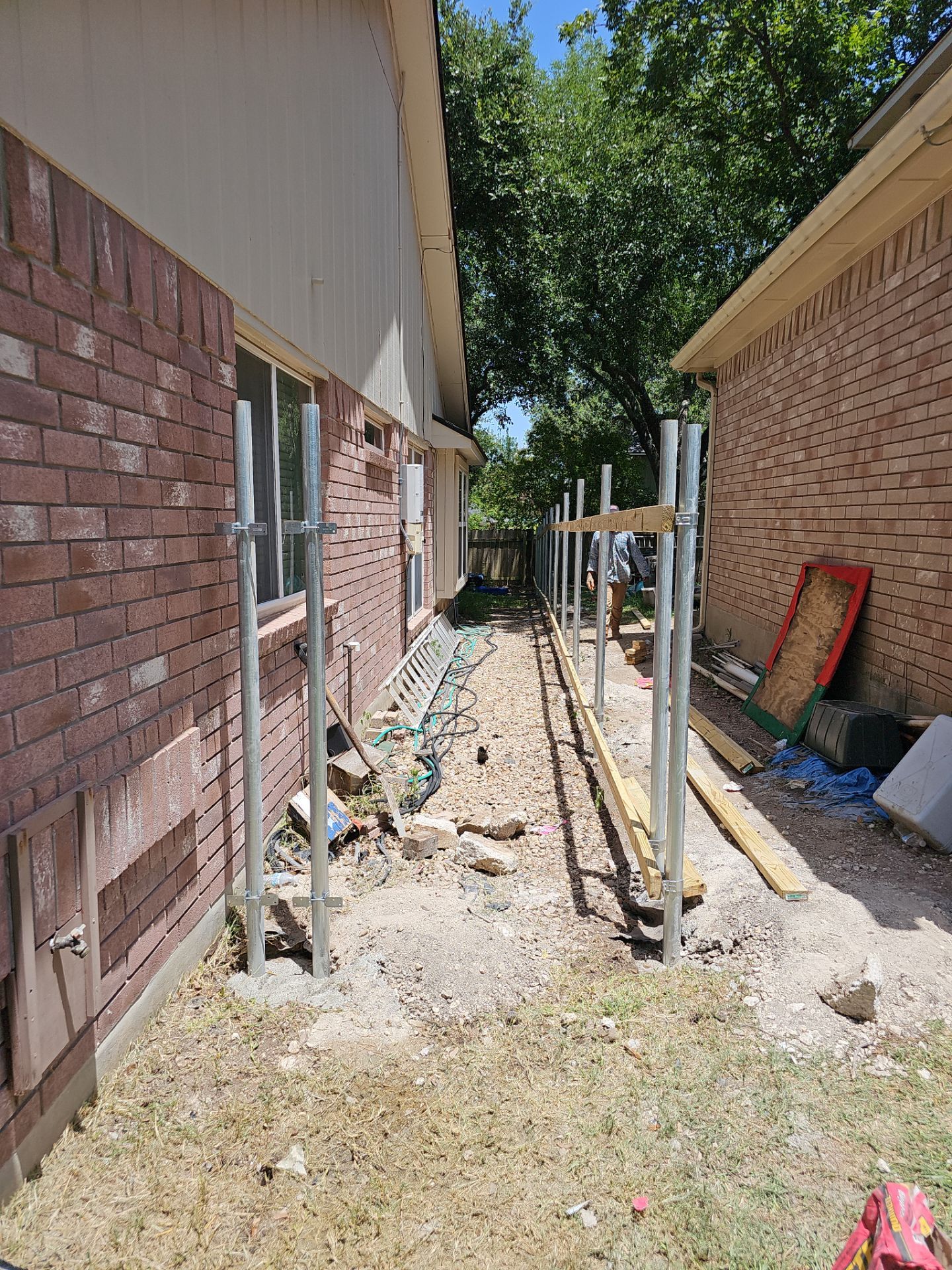 Fence Installation using Cedar Pickets by DeZign Roofing & Exteriors