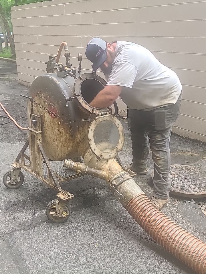 Sewer Repair using Perma-Liner through two manholes by Sureway Comfort John Wilcox Plumbing Heating Cooling