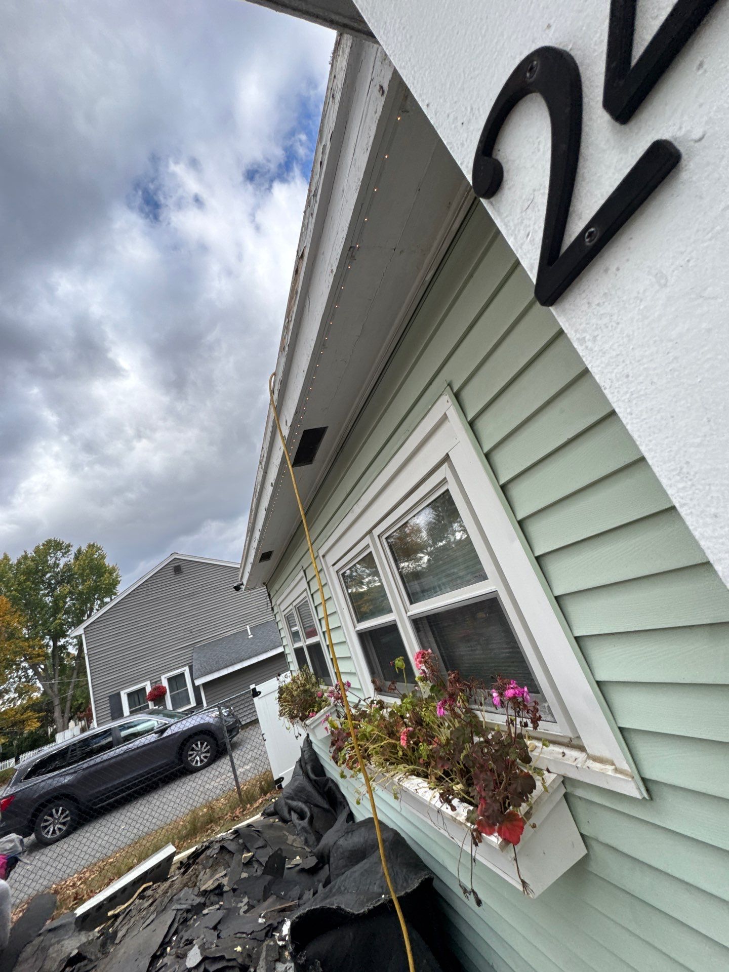 Westford EPDM Flat Roof with Gutter & Soffit/Fascia Replacement by Mighty Dog Roofing of Greater Middlesex County