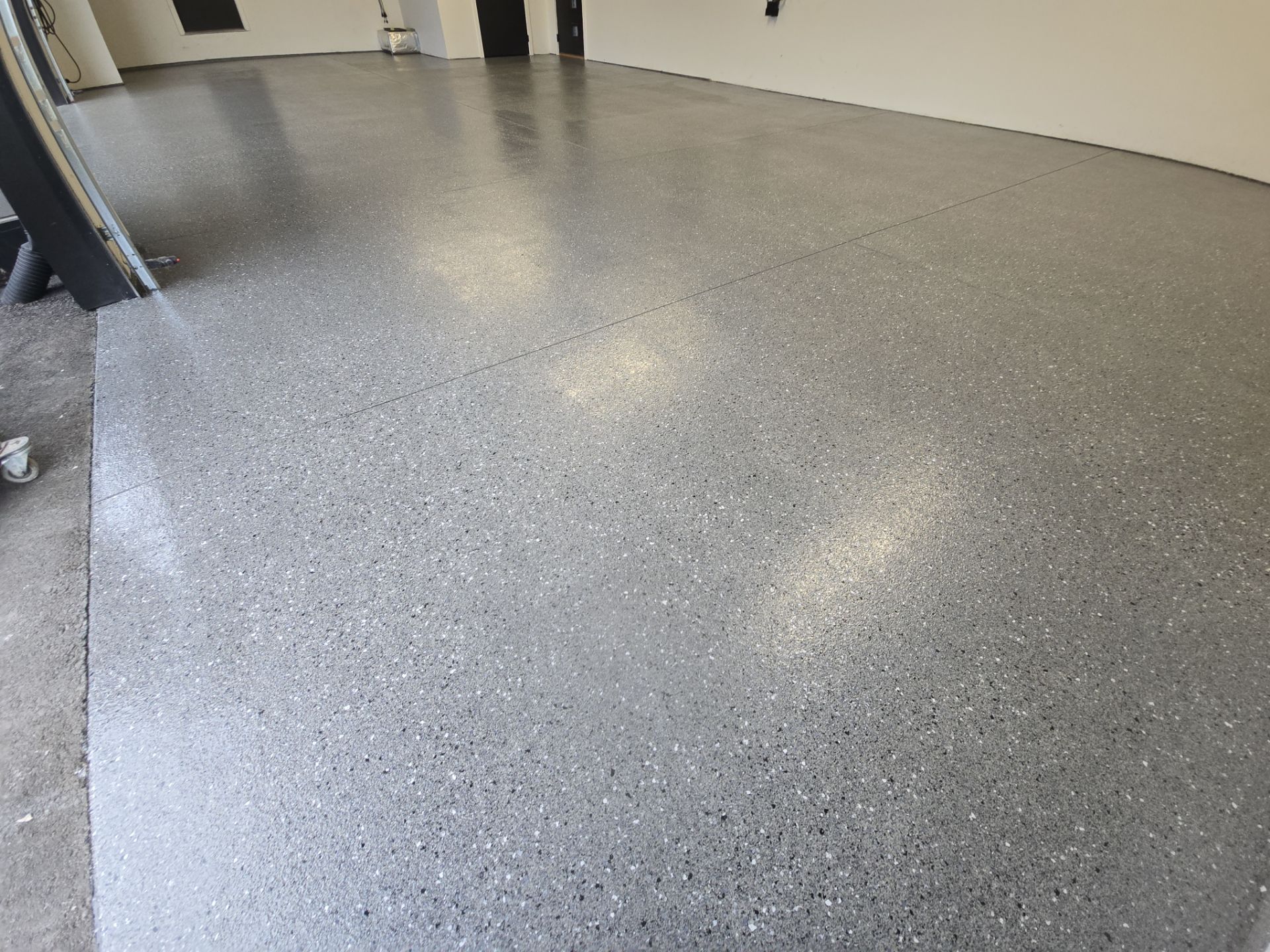 Garage Transformation using Slate Hybrid by Croc Coatings, LLC