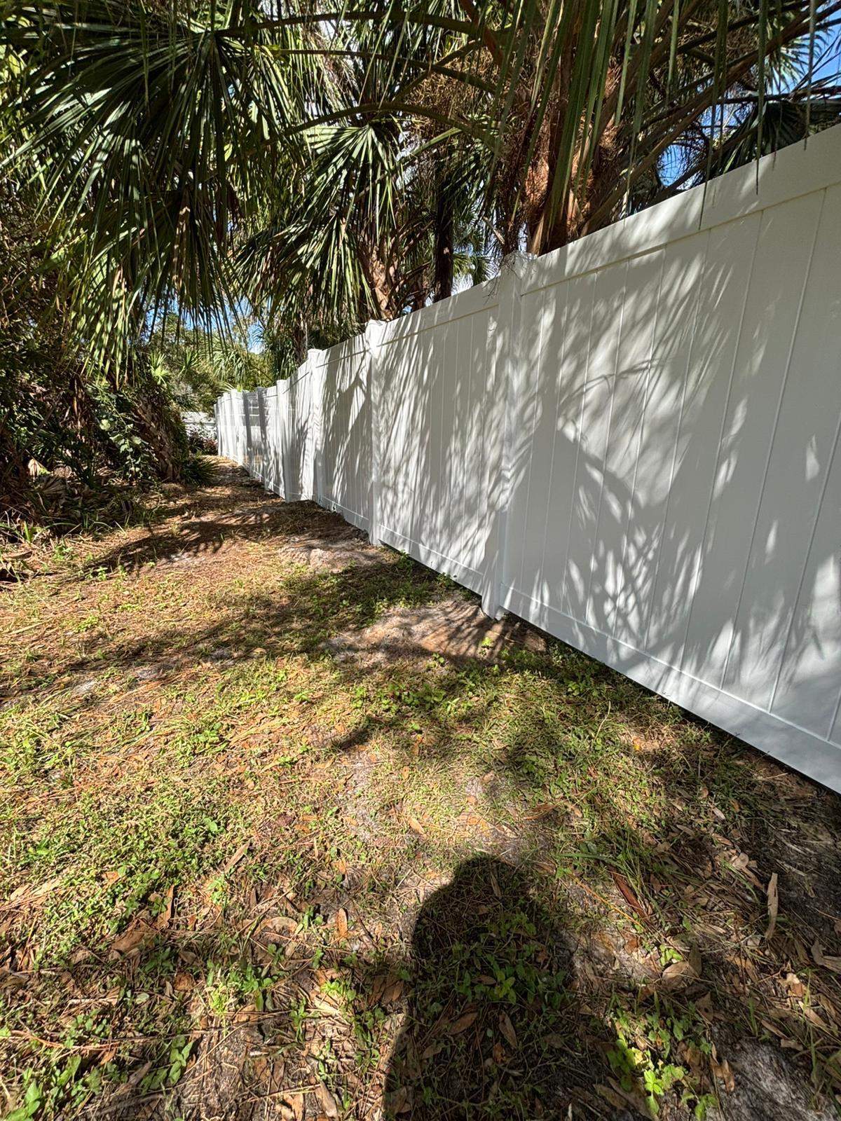 White Vinyl Privacy Fence and Gate Installation in North Port by True Fence LLC