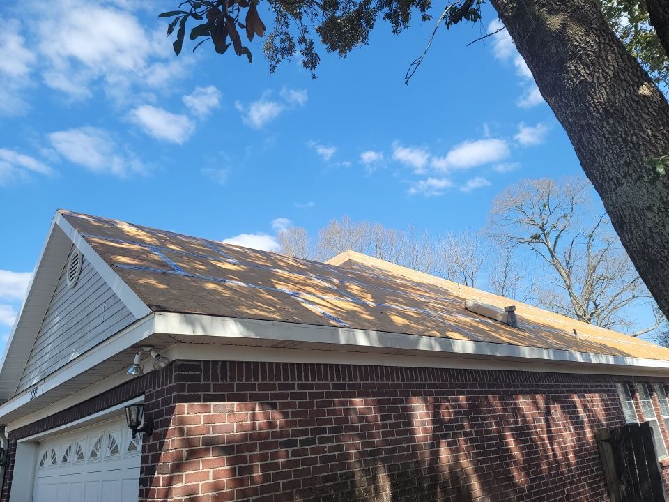 Residential Roofing Installation using Roof Replacement by American Roofing & Construction LLC