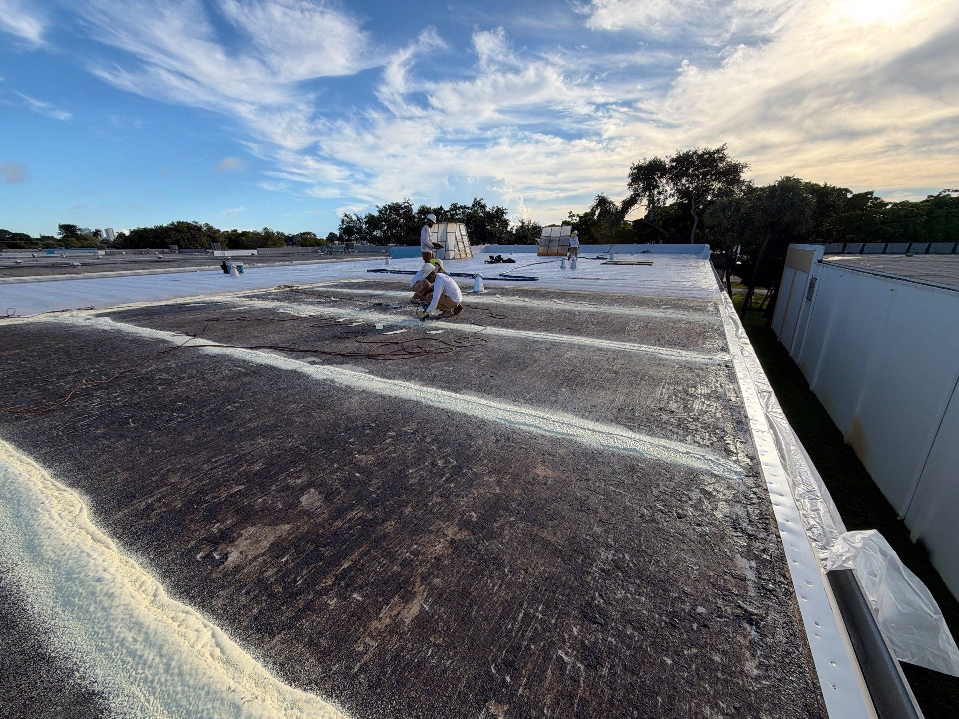 Fort Lauderdale Commercial Roof Restoration with Spray Foam and Silicone Coating by Roof King LLC