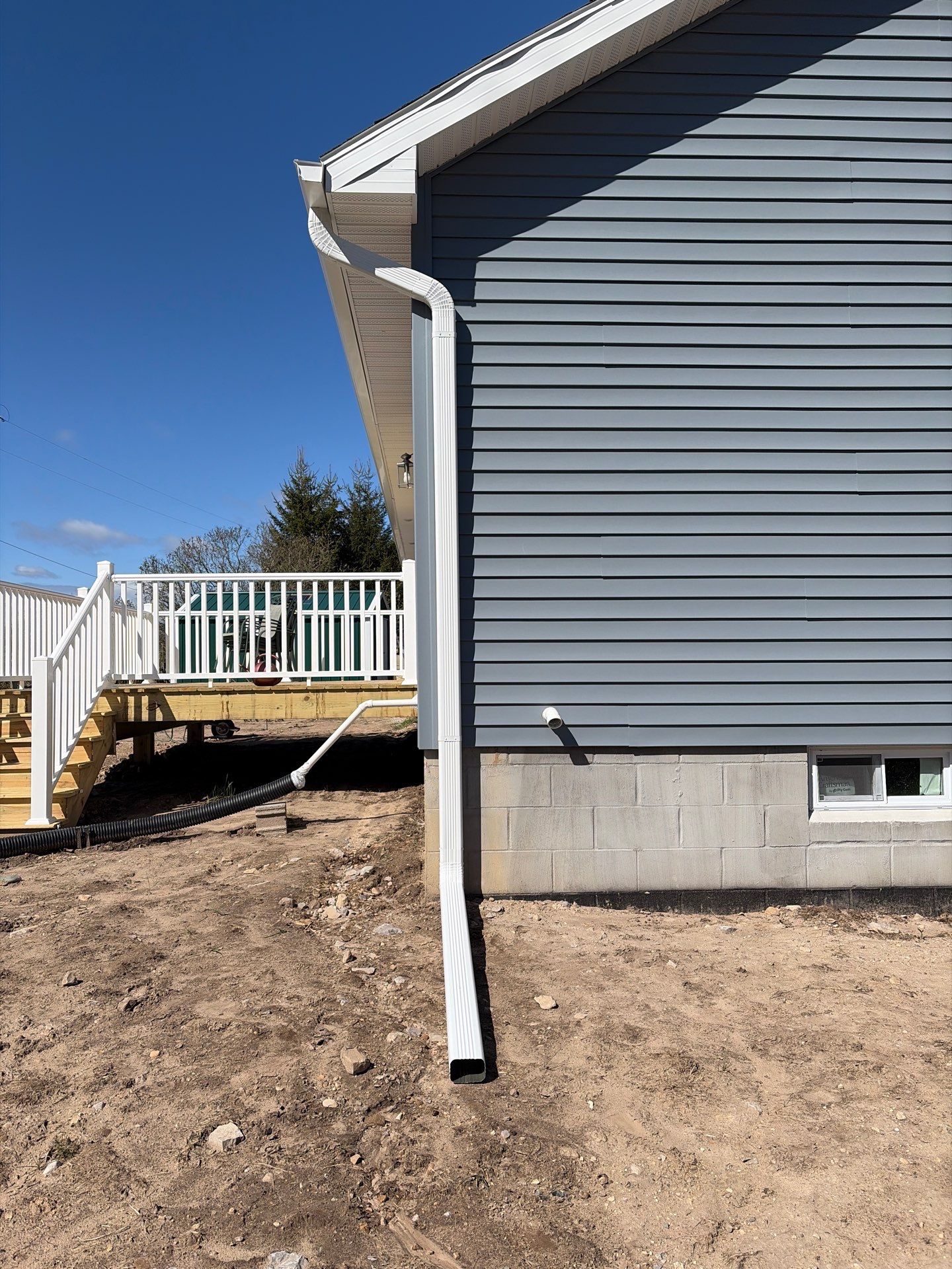 Gutter System Installation for New Home Construction in Petoskey by Rainbow Seamless Systems