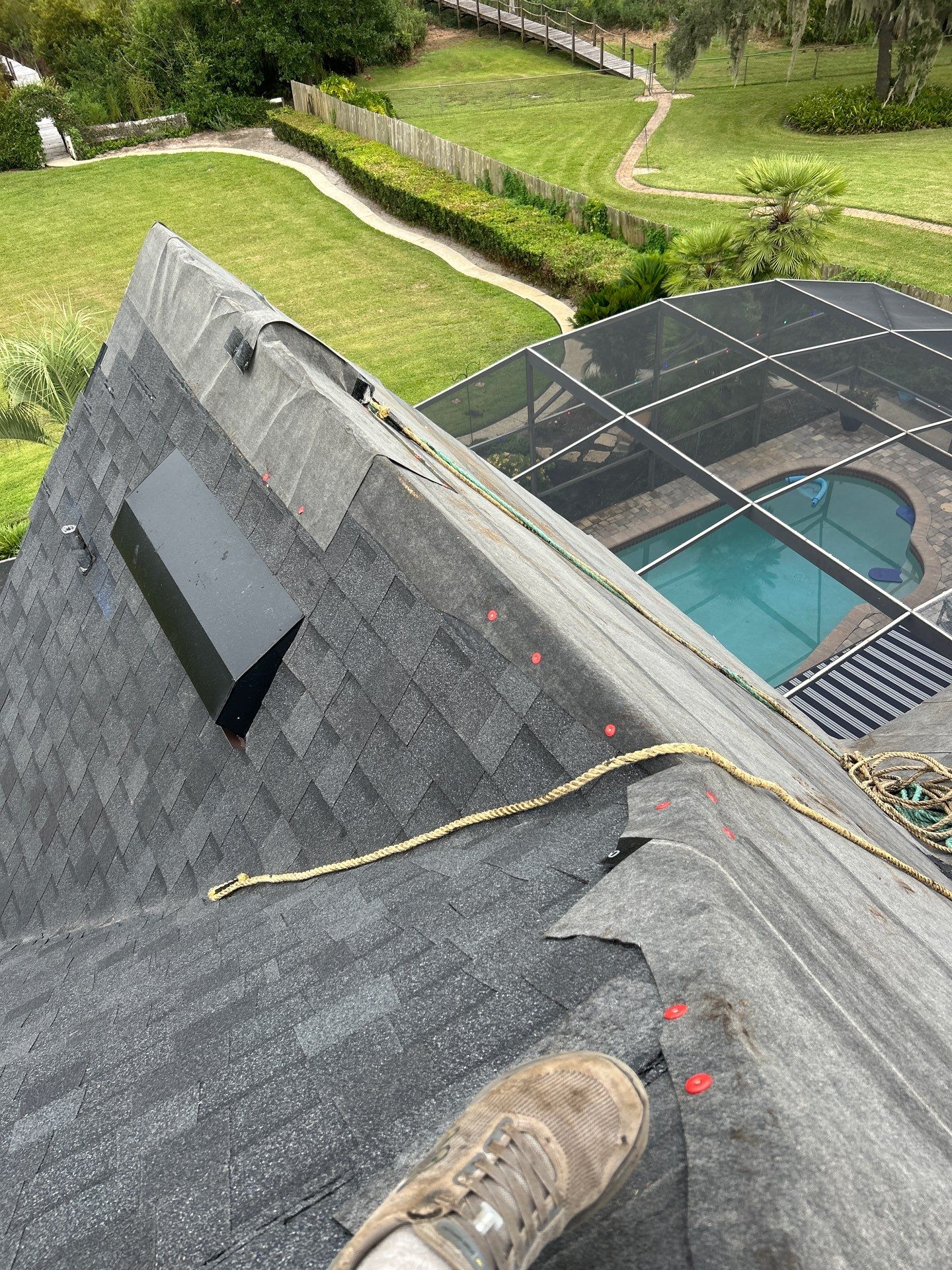 Residential Roofing Installation with Black Shadow Shingles in Clermont by Pinnacle Roofing Group