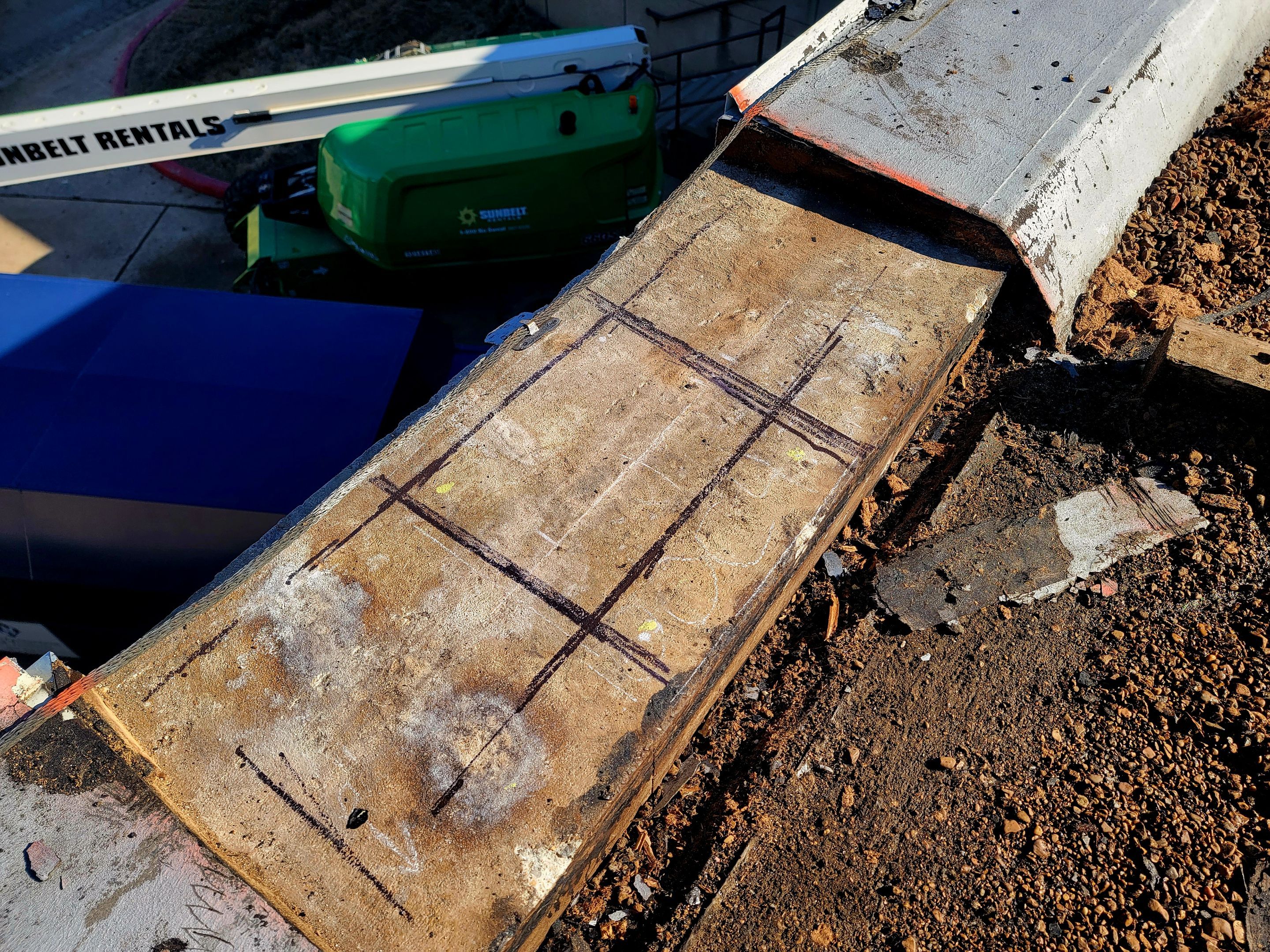 Scanning a roof section for rebar by Alsip Locating Service, LLC