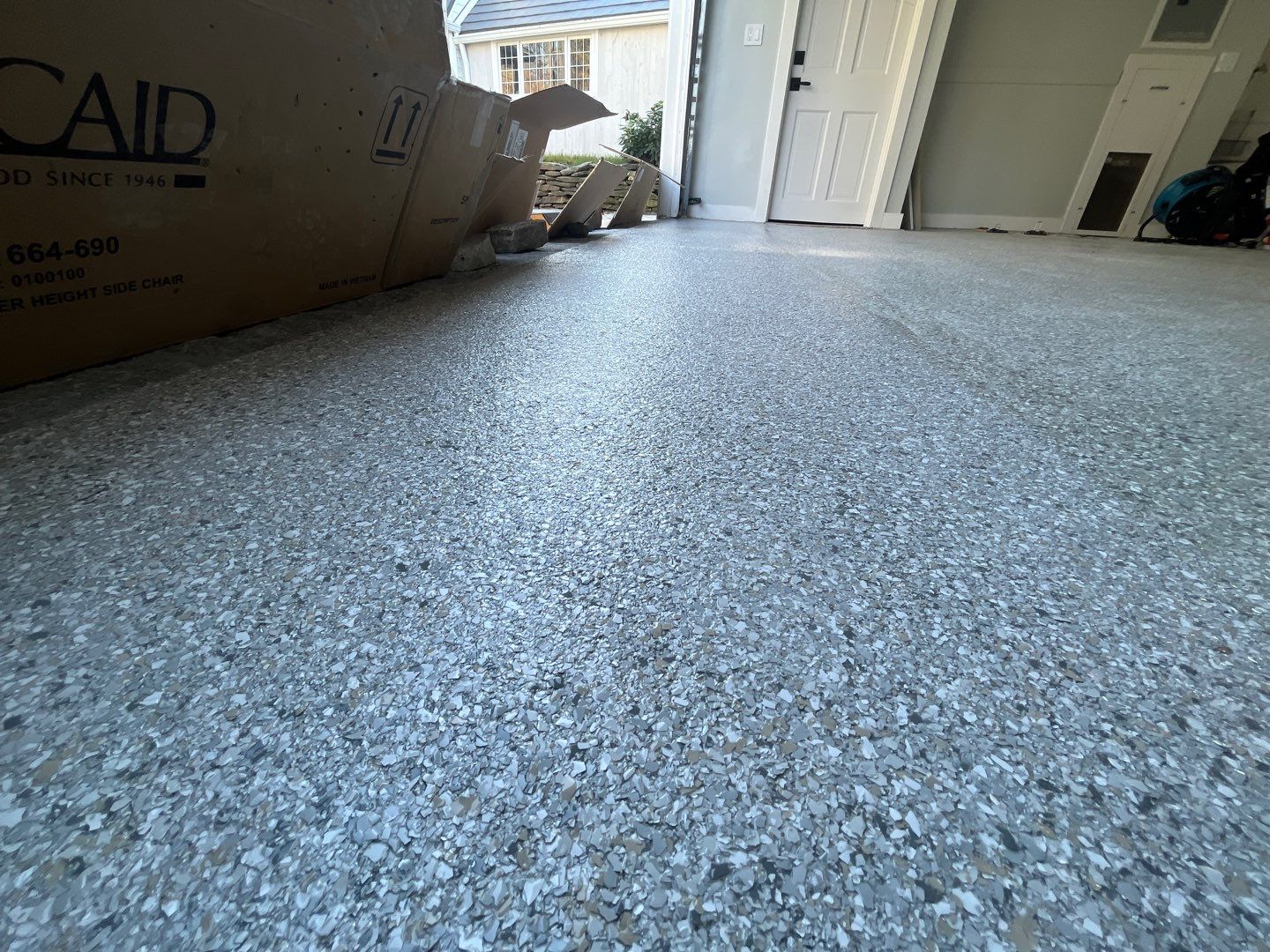 Garage in Sherborn, MA 01770 by Symphony Concrete Coatings