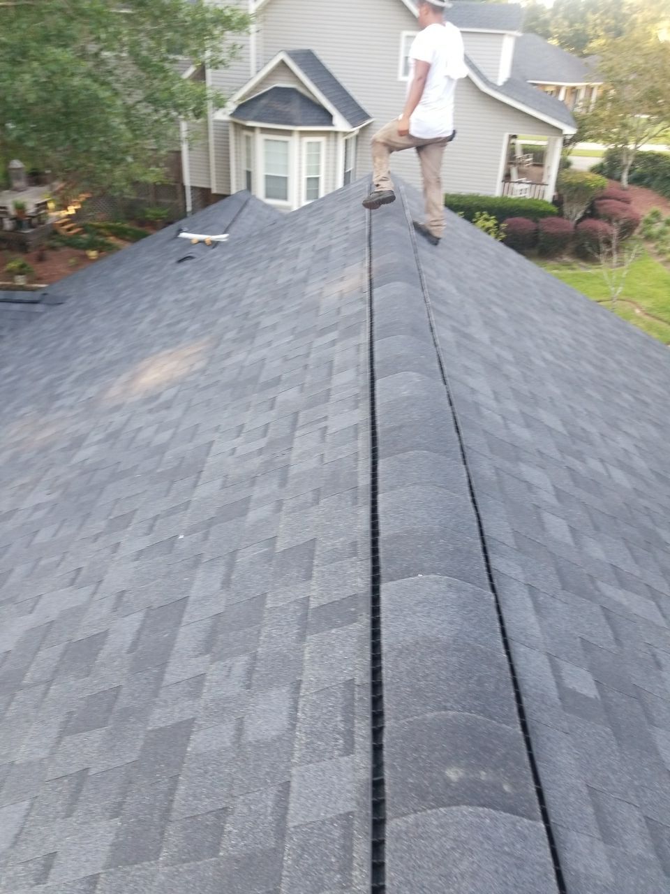 Residential Roofing Installation using Roof Replacement by American Roofing & Construction LLC