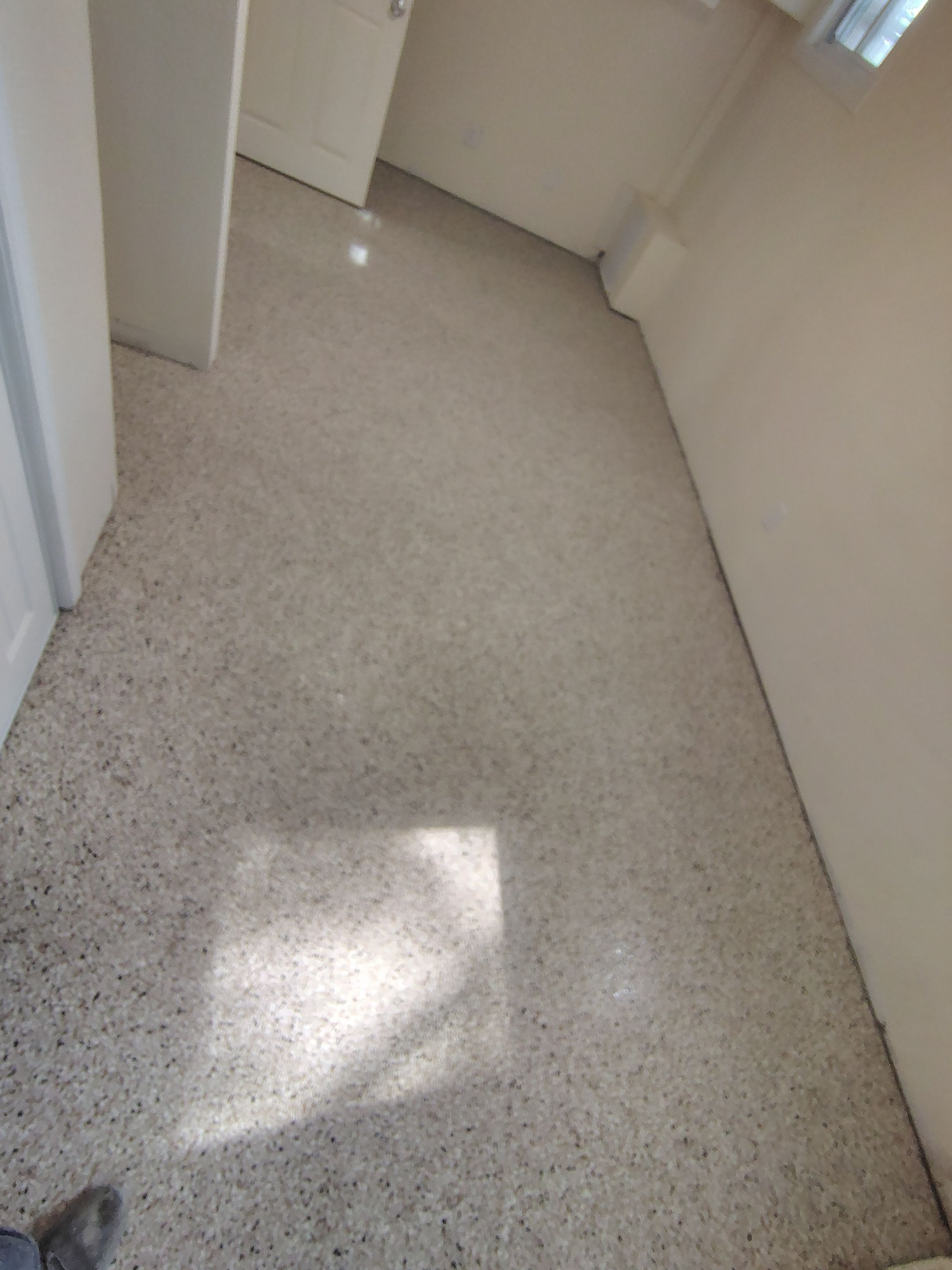 Comprehensive Basement Concrete Floor Coating and Crack Repair in Sioux Falls by Select Painting, Coatings & Garage Cabinets