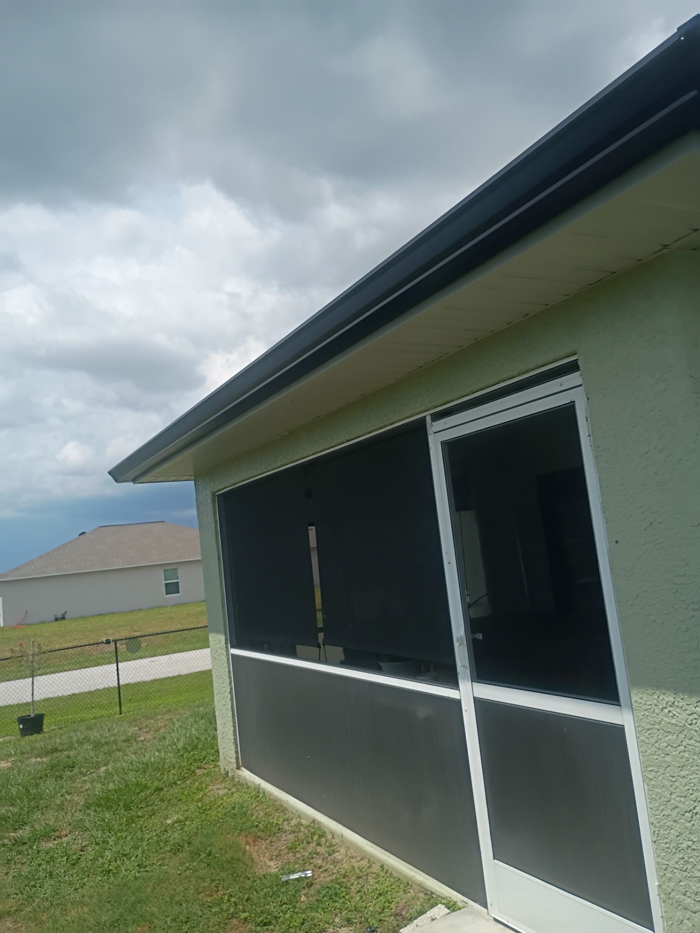 Black Seamless Gutters using K-Style Seamless Gutters in Cape Coral FL by Gutter Professors