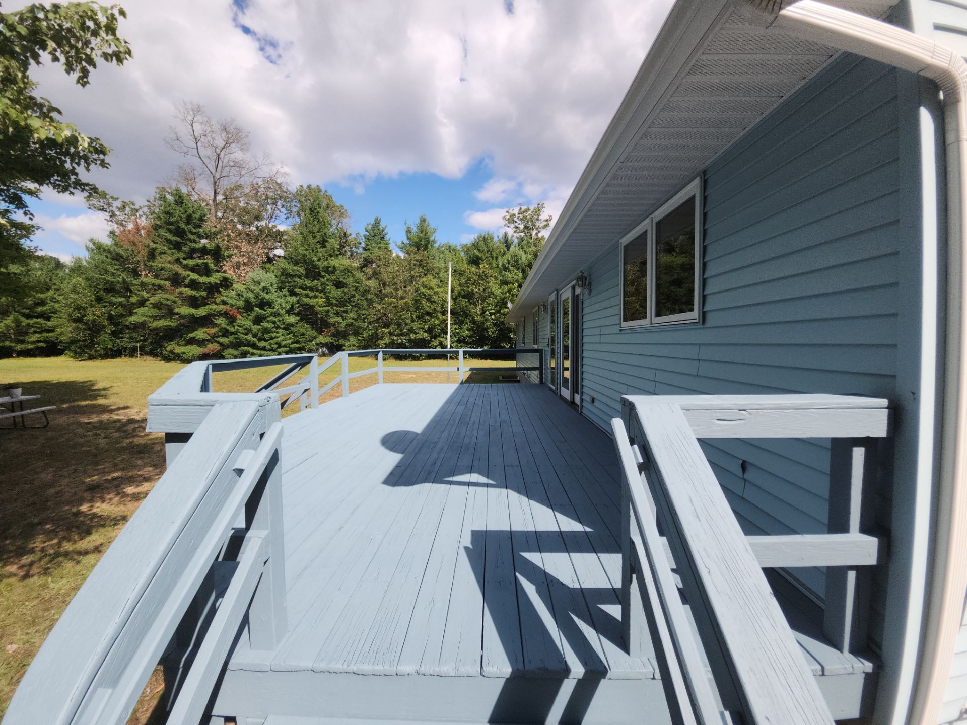 Deck staining and exterior foundation painting! by Gordon Painting