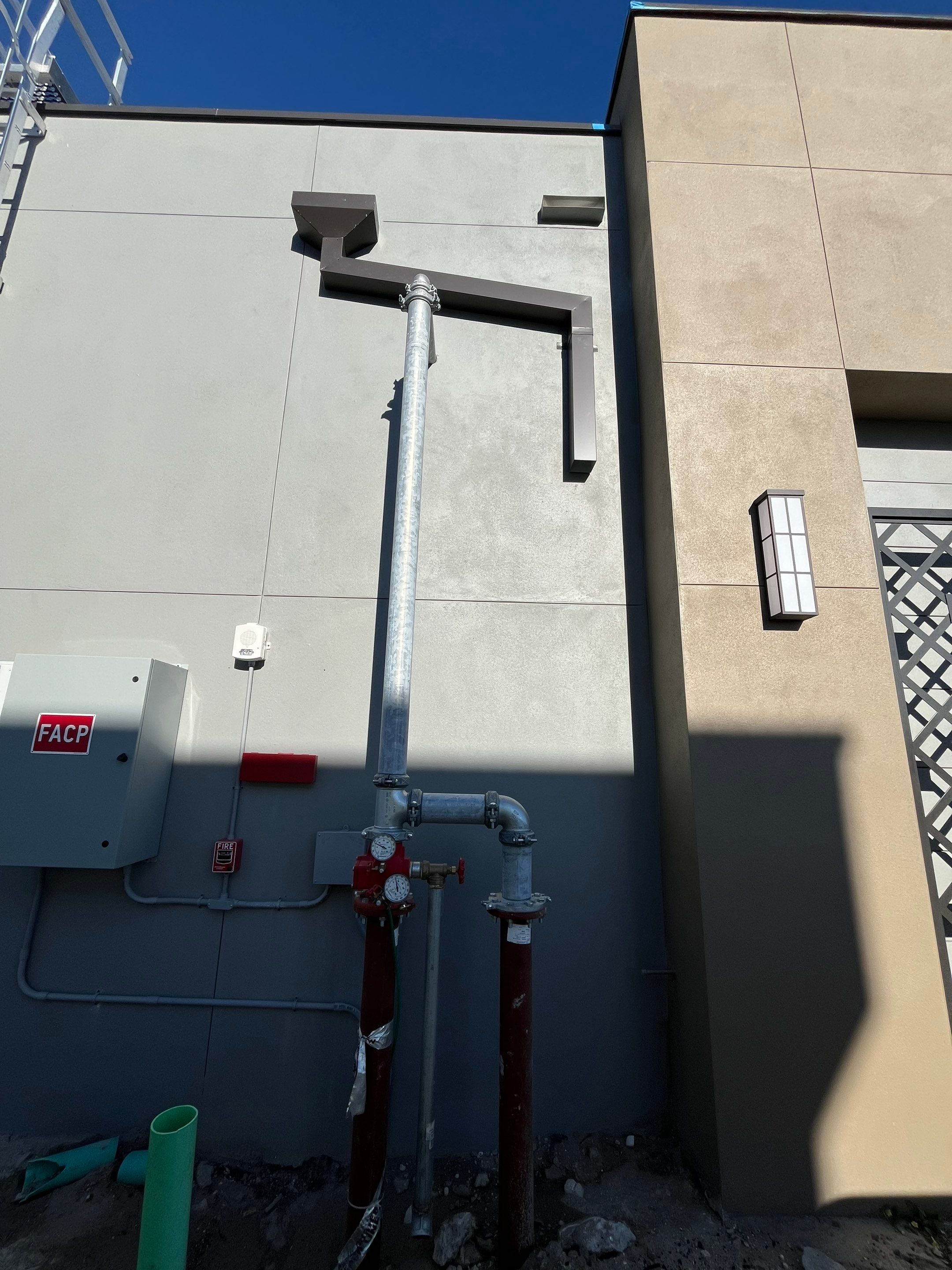 Downspout Installation using collector head in Cape Coral FL by Gutter Professors