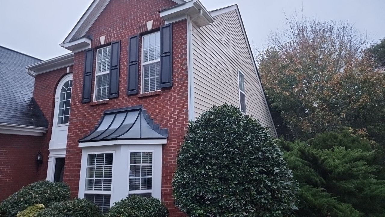 House Wash using cleaner by Power Wash Masters LLC