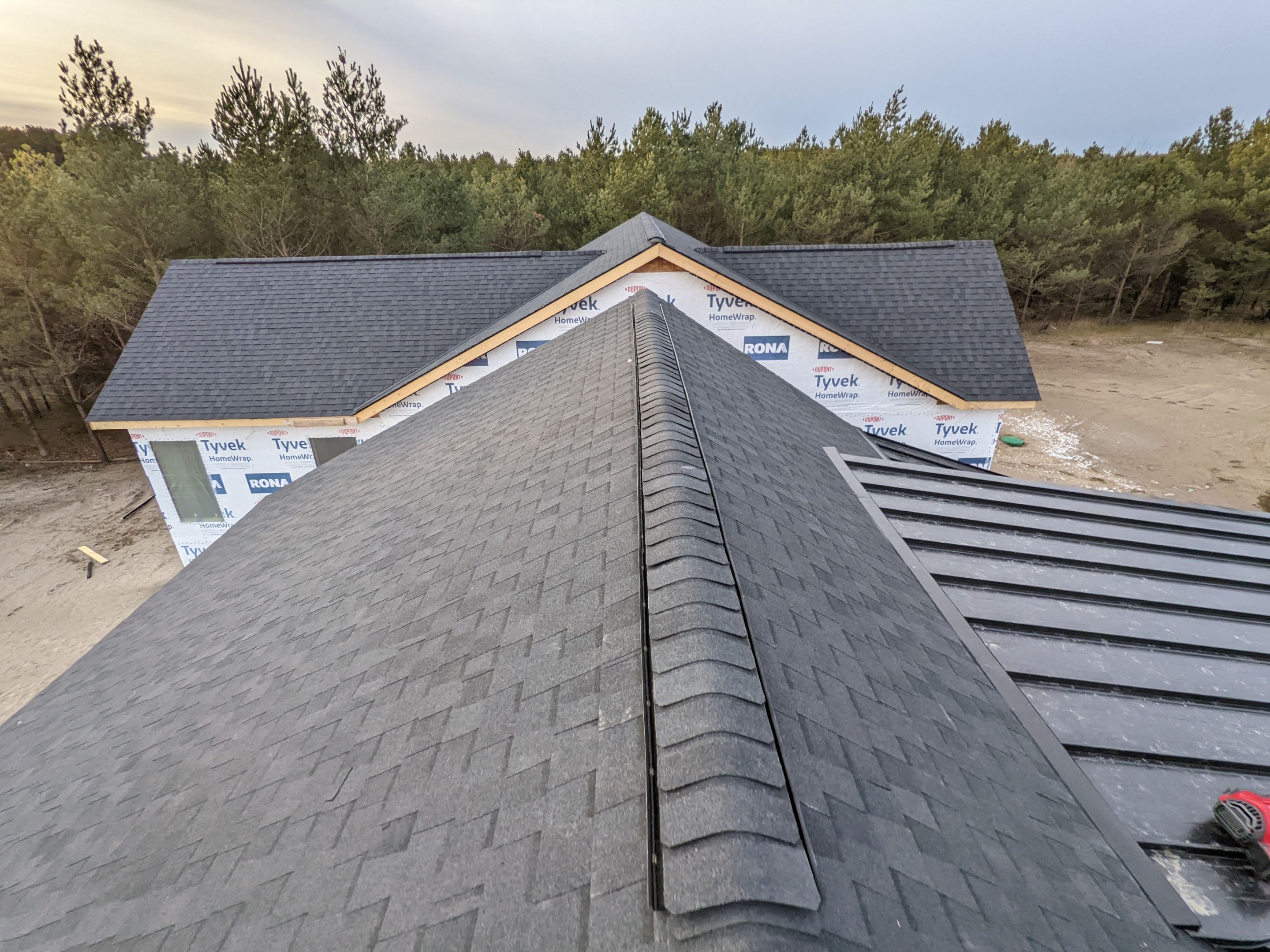 New Home Construction using 16" Standing Seam Panels, & Shingles  by Jay Carter Roofing & Sheet Metal