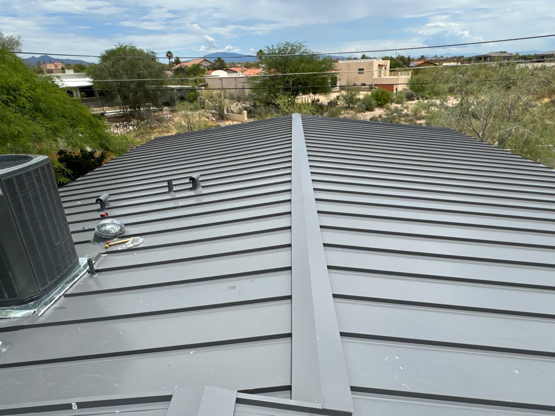 Charcoal Gray Standing Seam by Reimagine Roofing