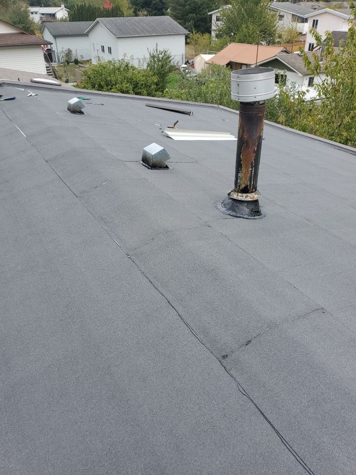 Residential ReRoofing Installation using IKO 2ply sbs  by Top Notch Roofing Inc