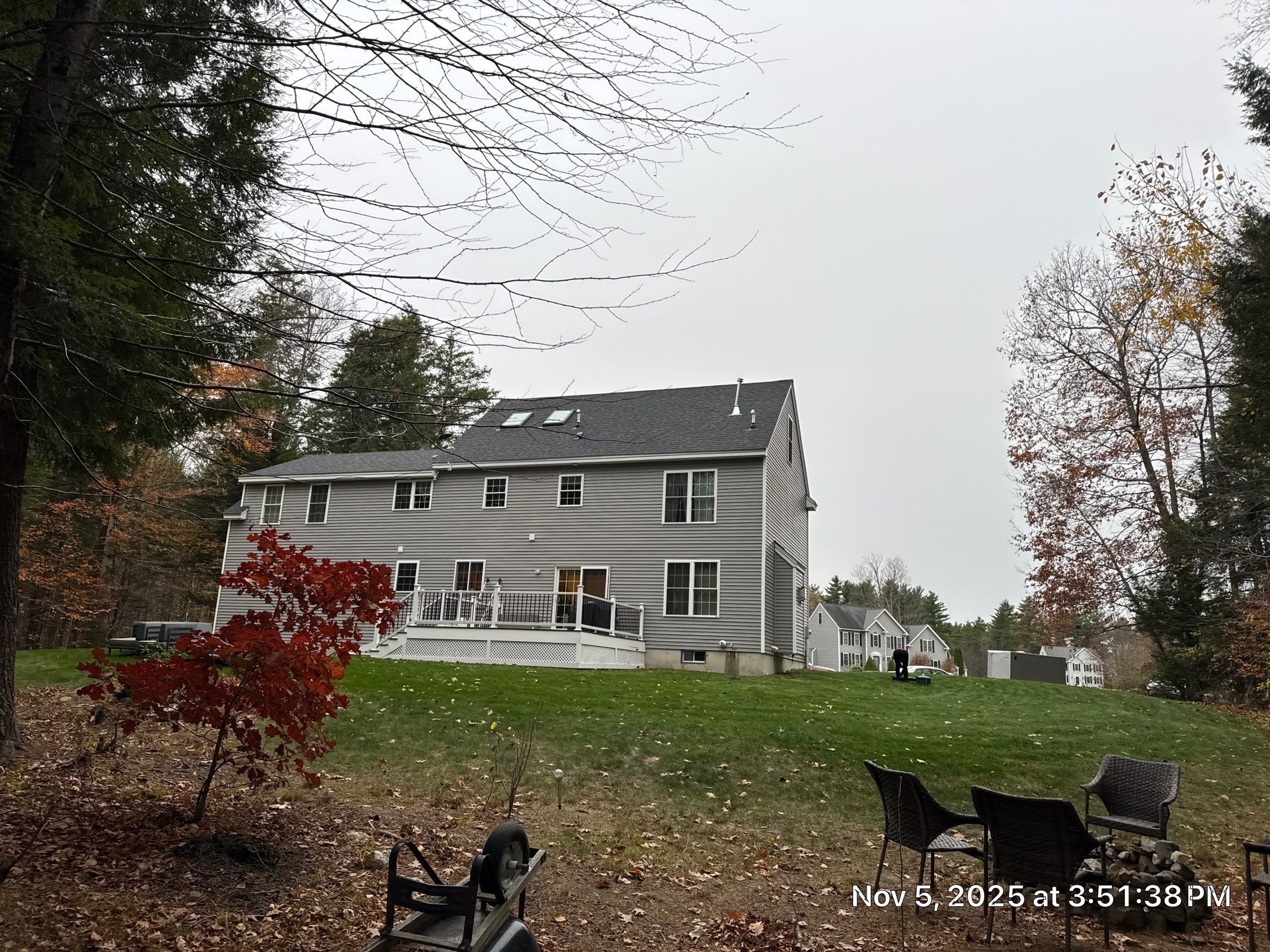 Brentwood, NH Roof Replacement with Velux Skylights and Onyx Black Owens Corning Shingles by Compass exteriors
