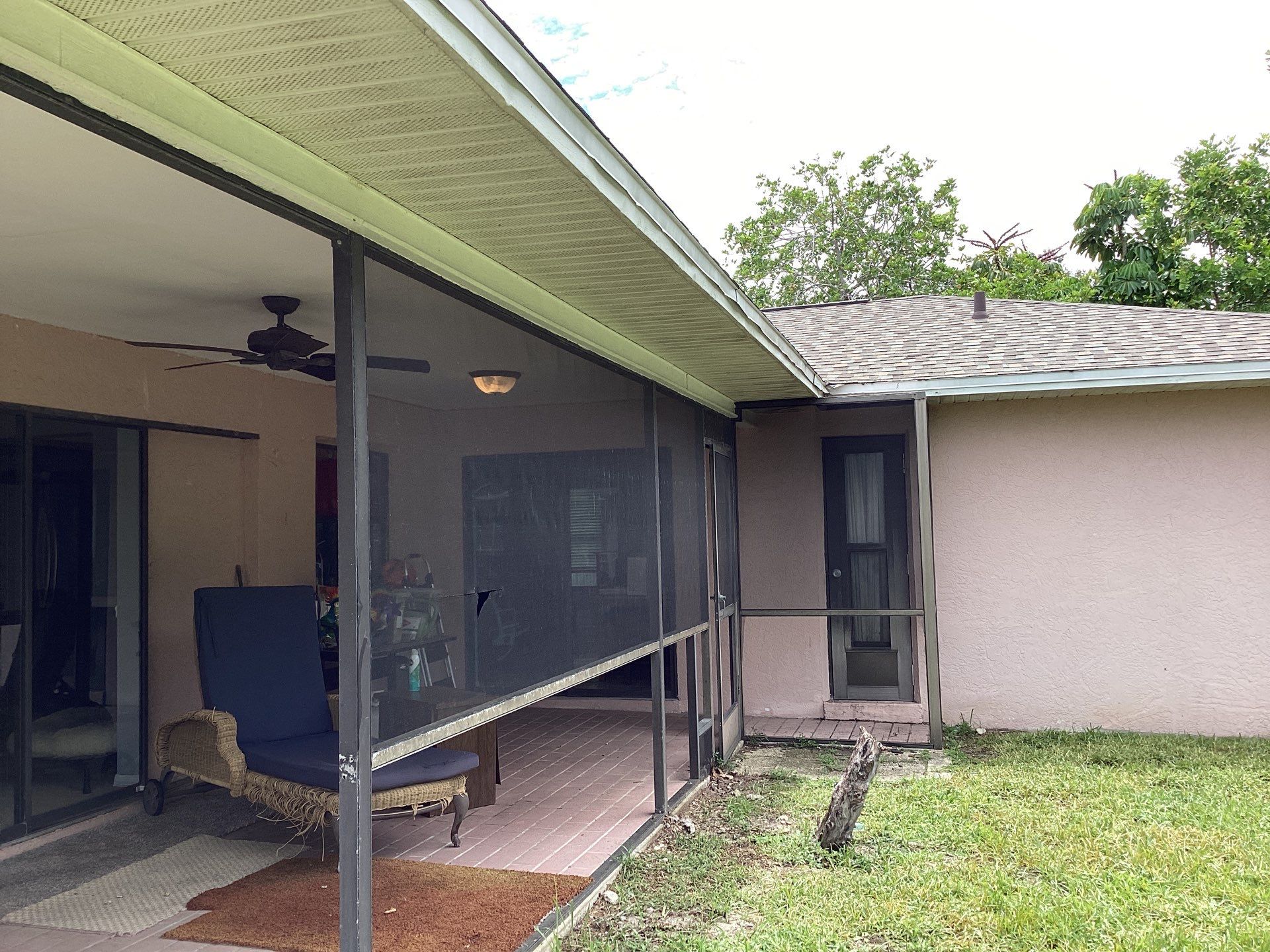 Replace gutter using White Down Spouts in Cape Coral FL by Gutter Professors