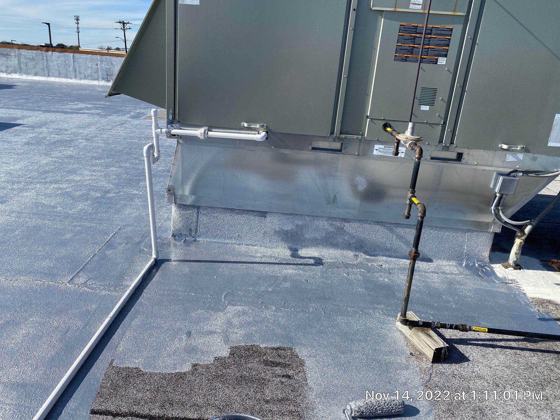 Commercial Coating using Poly Urerthane and Silicone Coating by Just In Time Roofing and Restoration