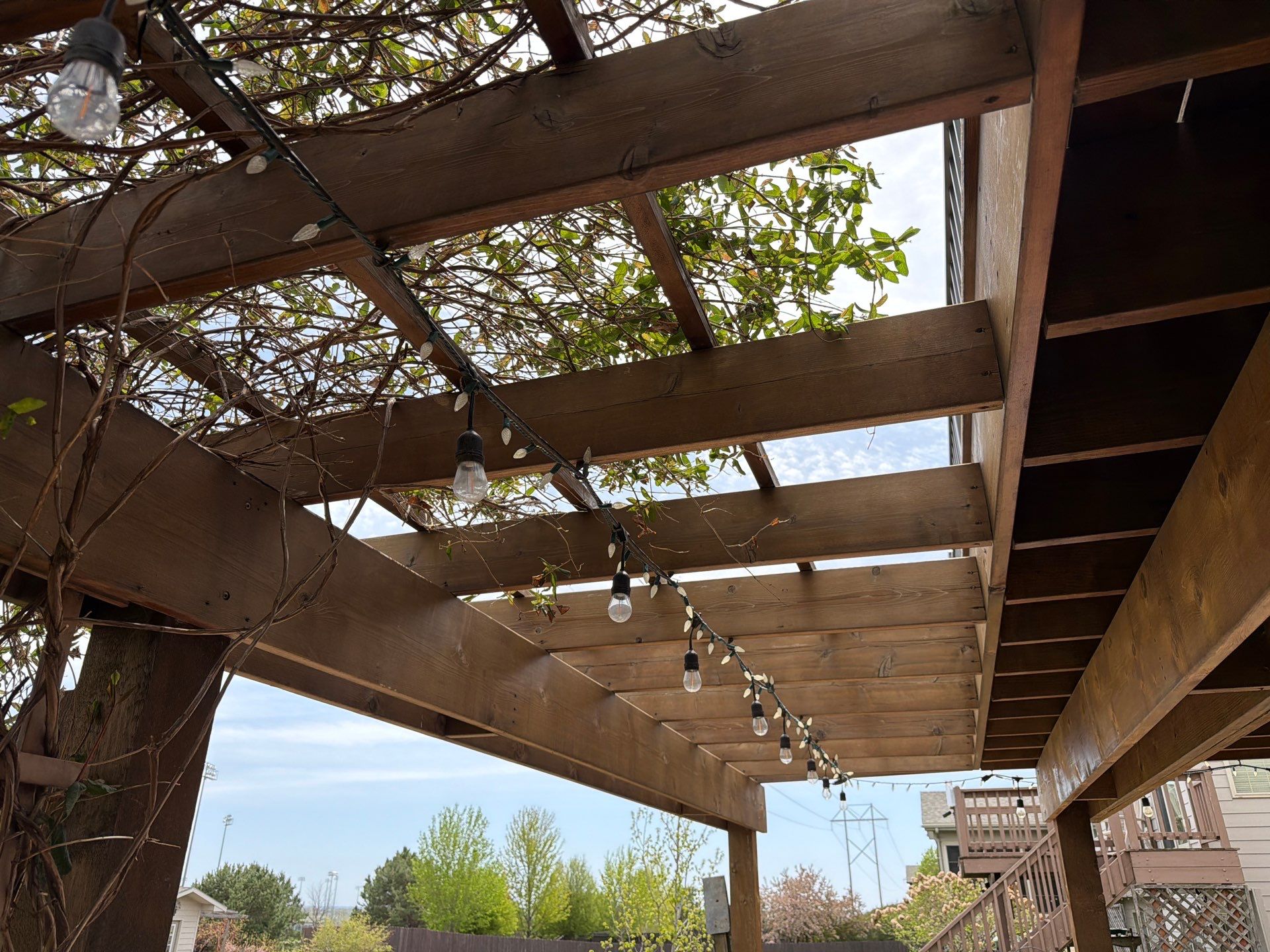 Tiered Wood Deck and Pergola Refinishing in Sioux Falls by Select Painting, Coatings & Garage Cabinets