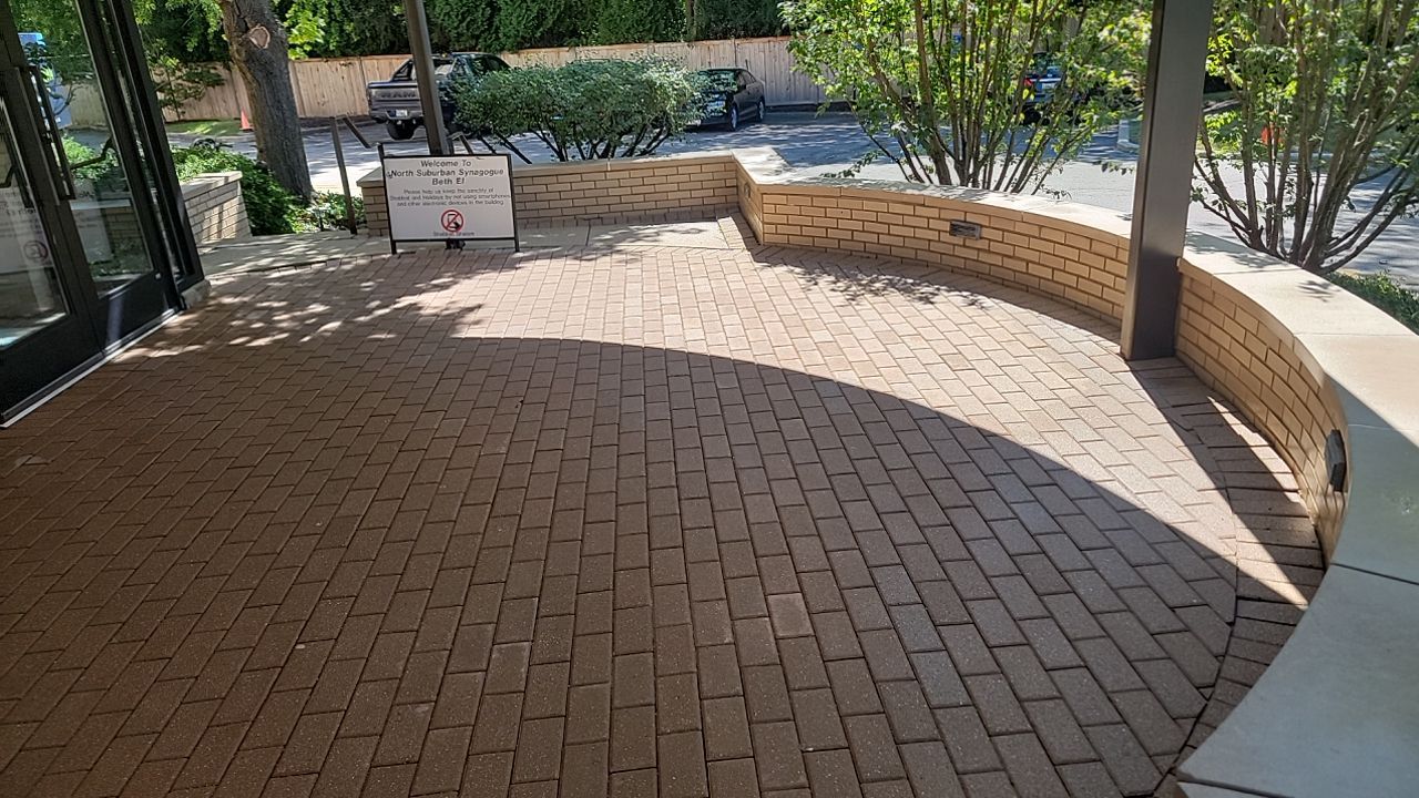 commercial pressure washing using Algaecide, soft wash soap by Northern Power Washing LLC.