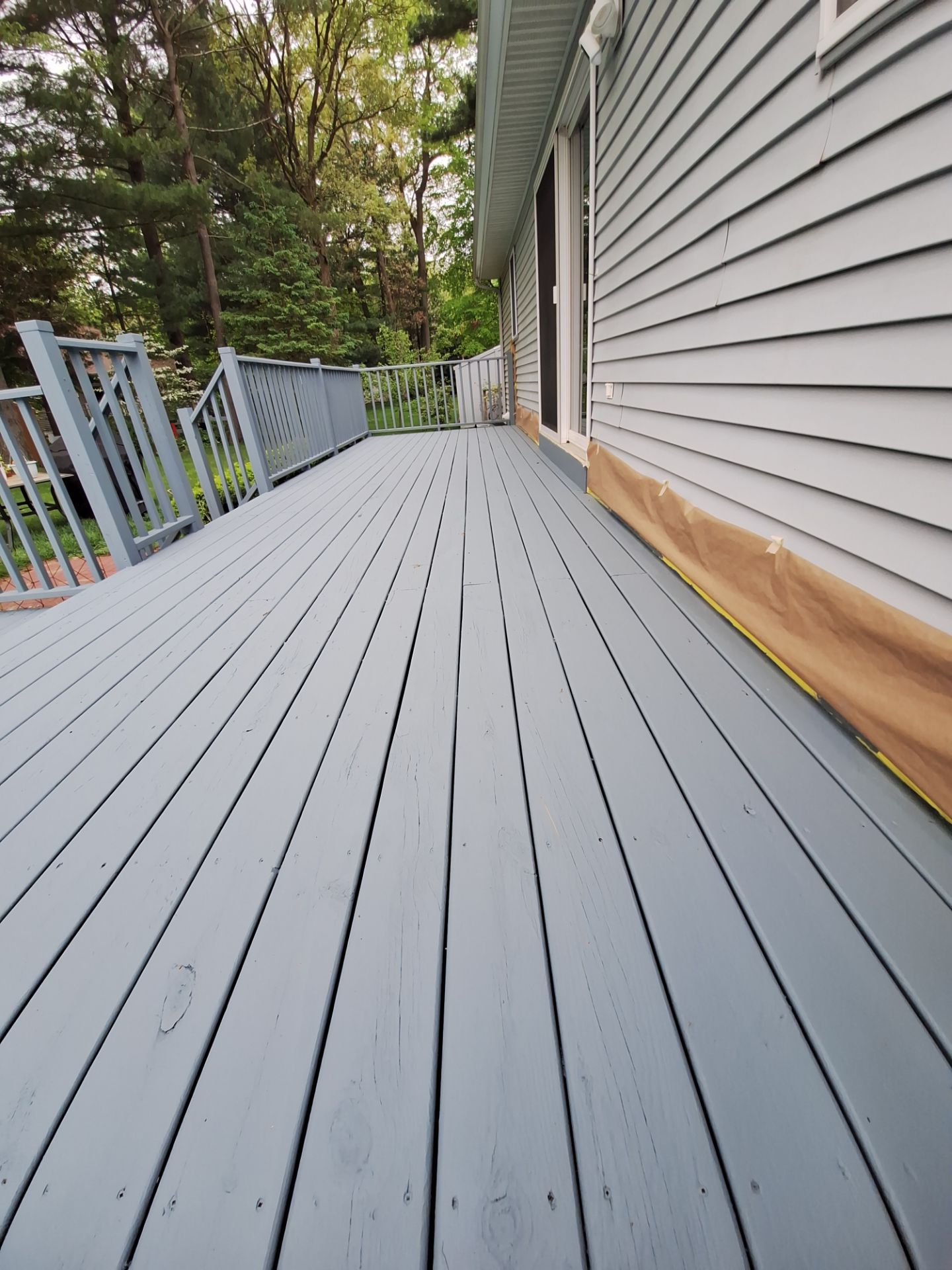Repaint bedroom furniture, Pergola, and doors. Stain decking by Gordon Painting