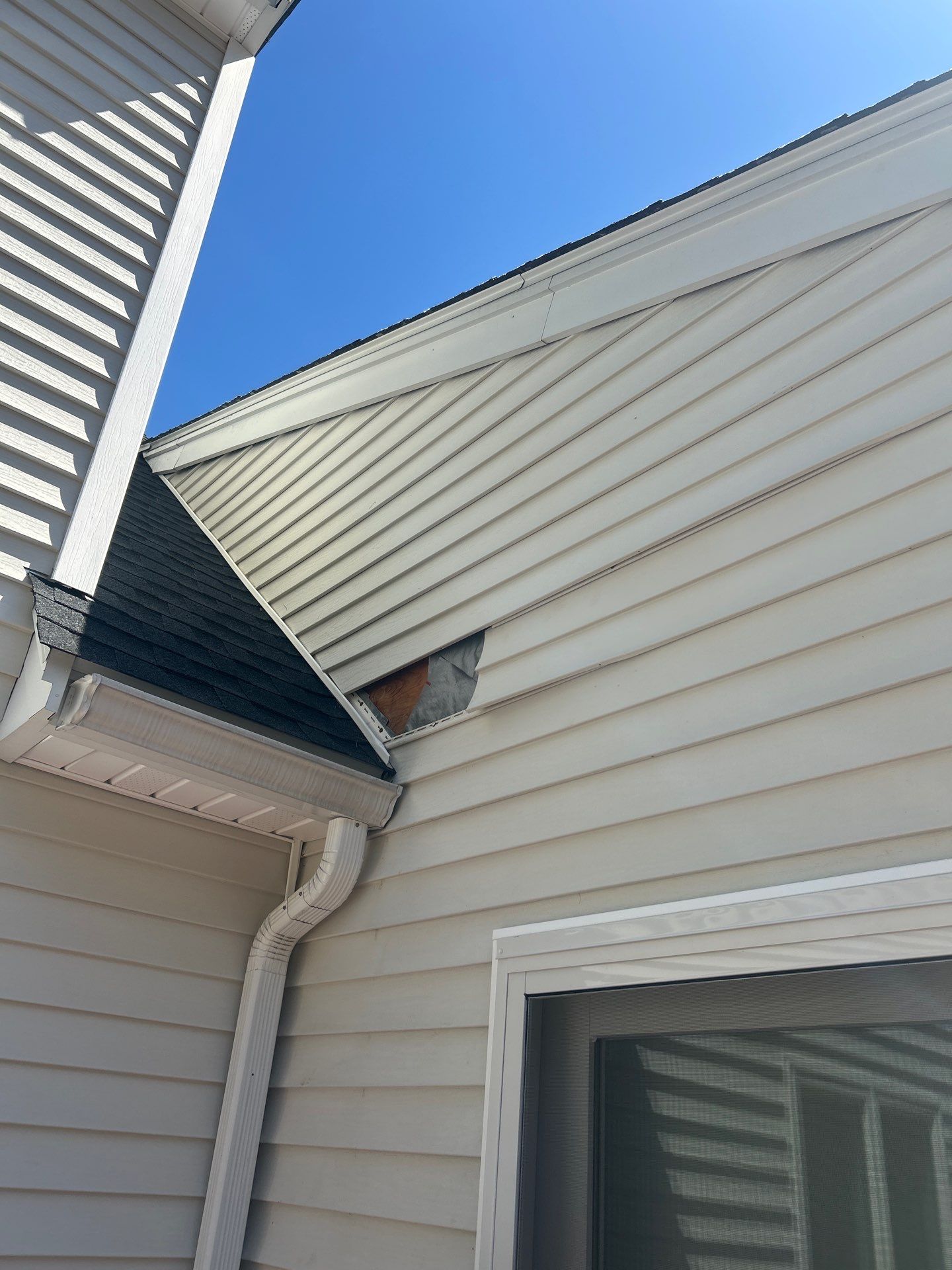 Vinyl Siding Repair with Spot Replacement by Mighty Dog Roofing of Greater Middlesex County