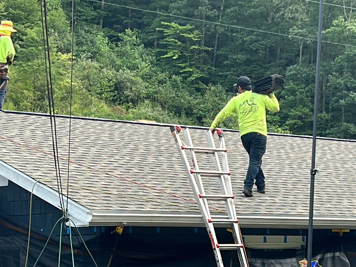 Residential Roofing Installation using Performance Shingles by Mr. Roofer