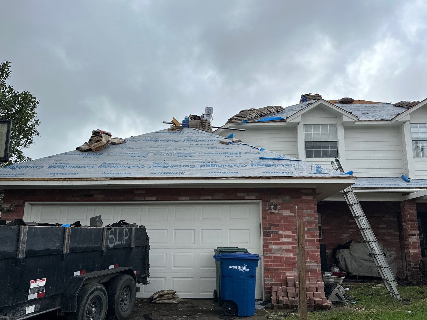 Residential Roofing Installation using Certainteed Landmark Moire Black by Galvan Roofing and Construction
