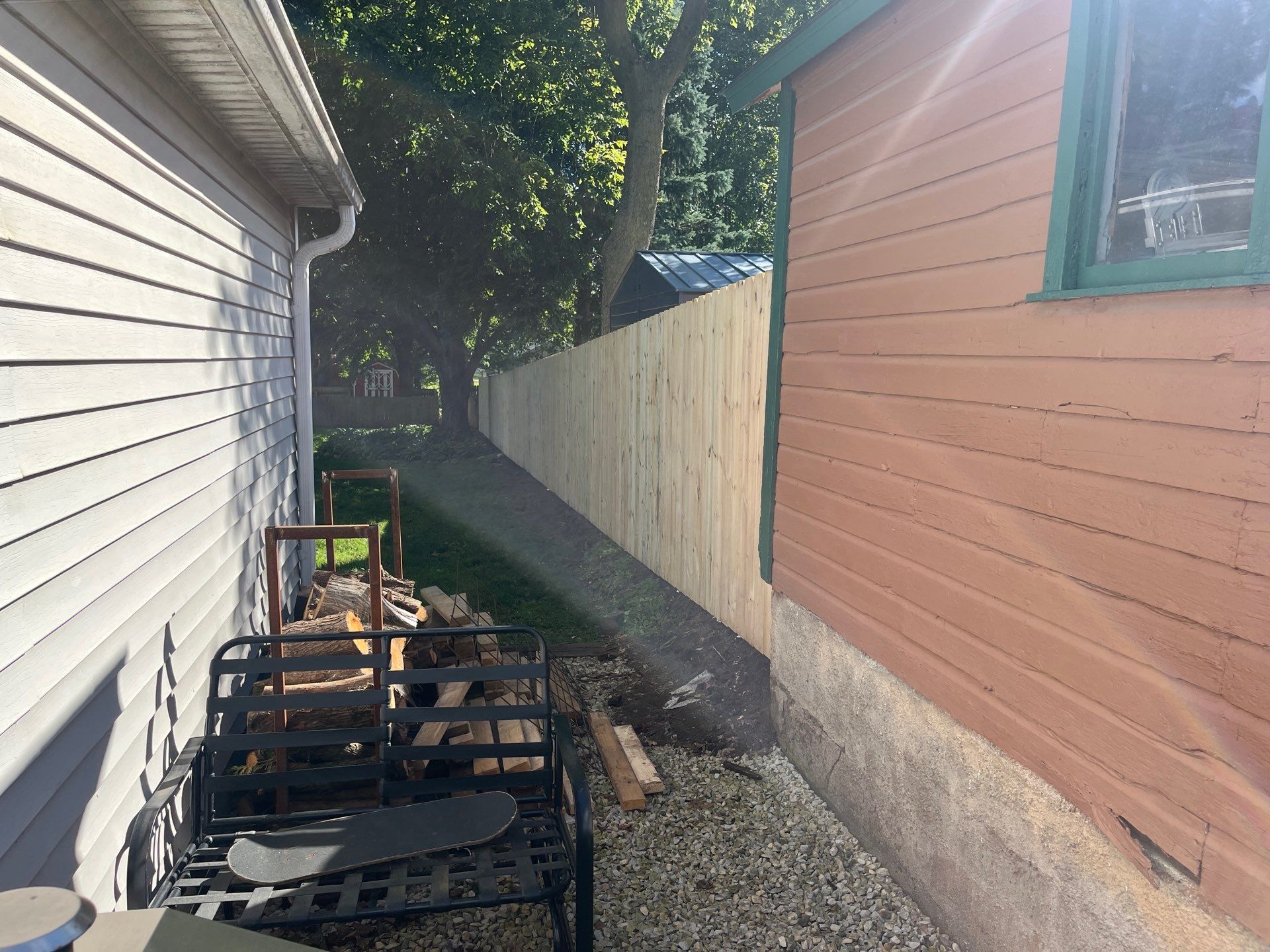Pressure-Treated Wood Privacy Fence Installation in Waverly, Iowa by Perfect Picket Fence and Stain