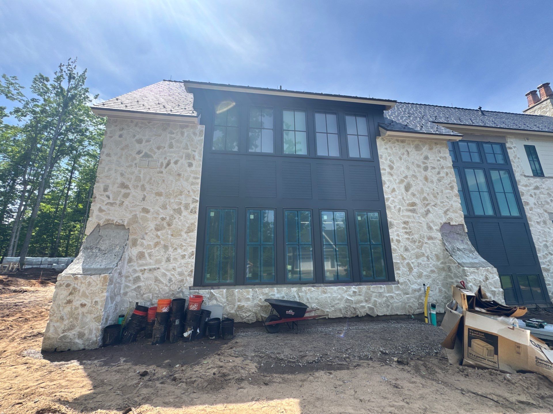 Half Round Gutter Installation for Petoskey Residence by Rainbow Seamless Systems