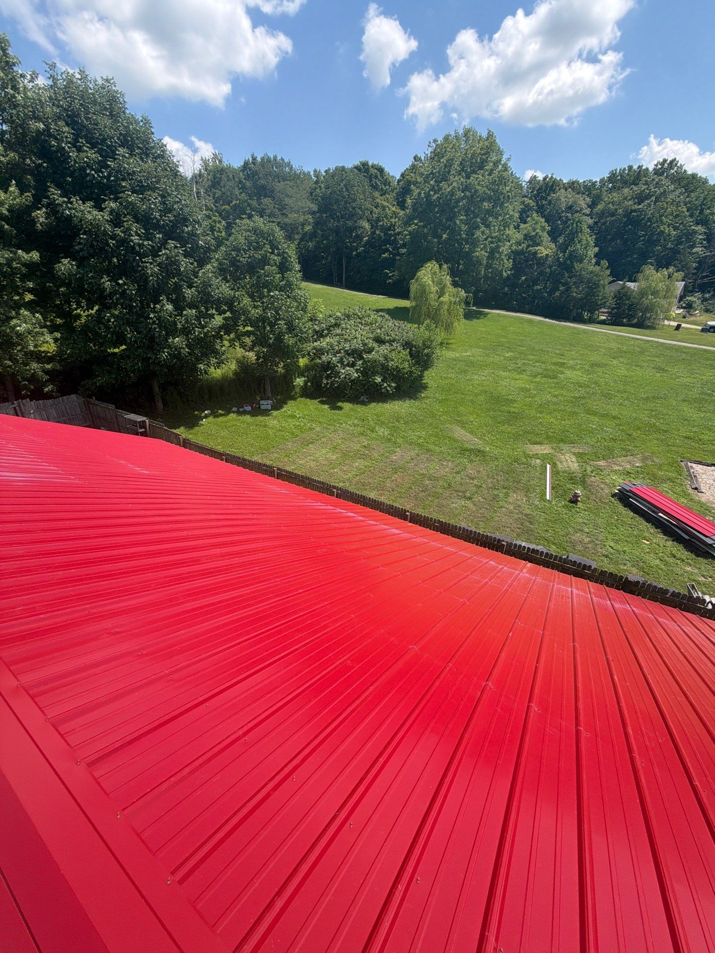 Classic Rib Metal Roofing - Dark Red by Hoel Roofing & Remodeling