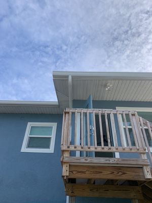 Downspout Installation for Two-Story Home in Fort Myers FL by Gutter Professor