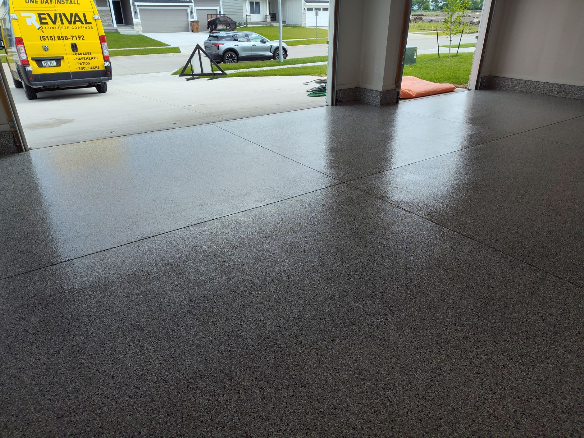 New Bondurant Garage Floor Coating by Revival Concrete Coatings, LLC