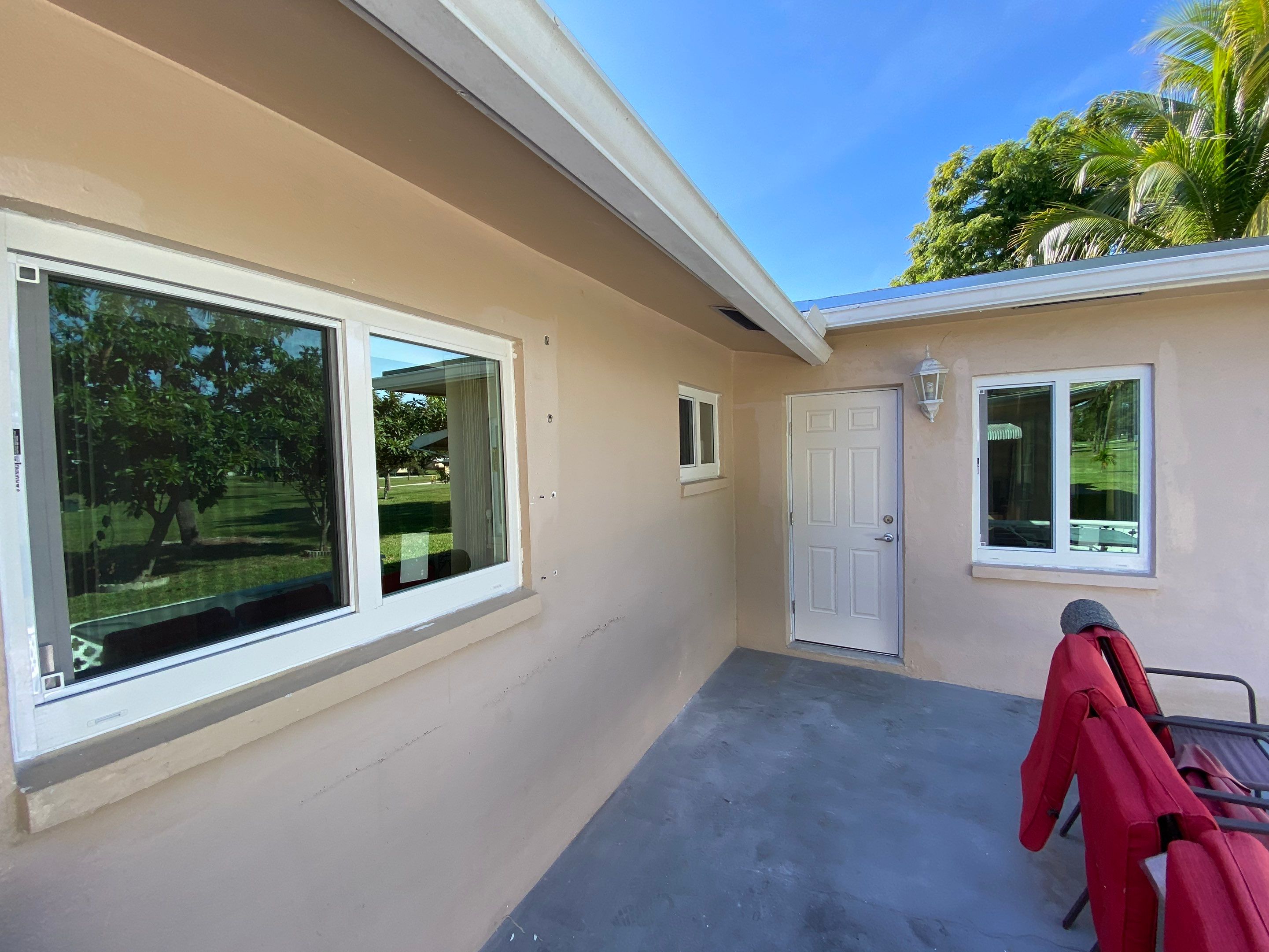 Tamarac Residential Entry Door and Aluminum Window Installation Project by The Door Doctor of South Florida, Inc.