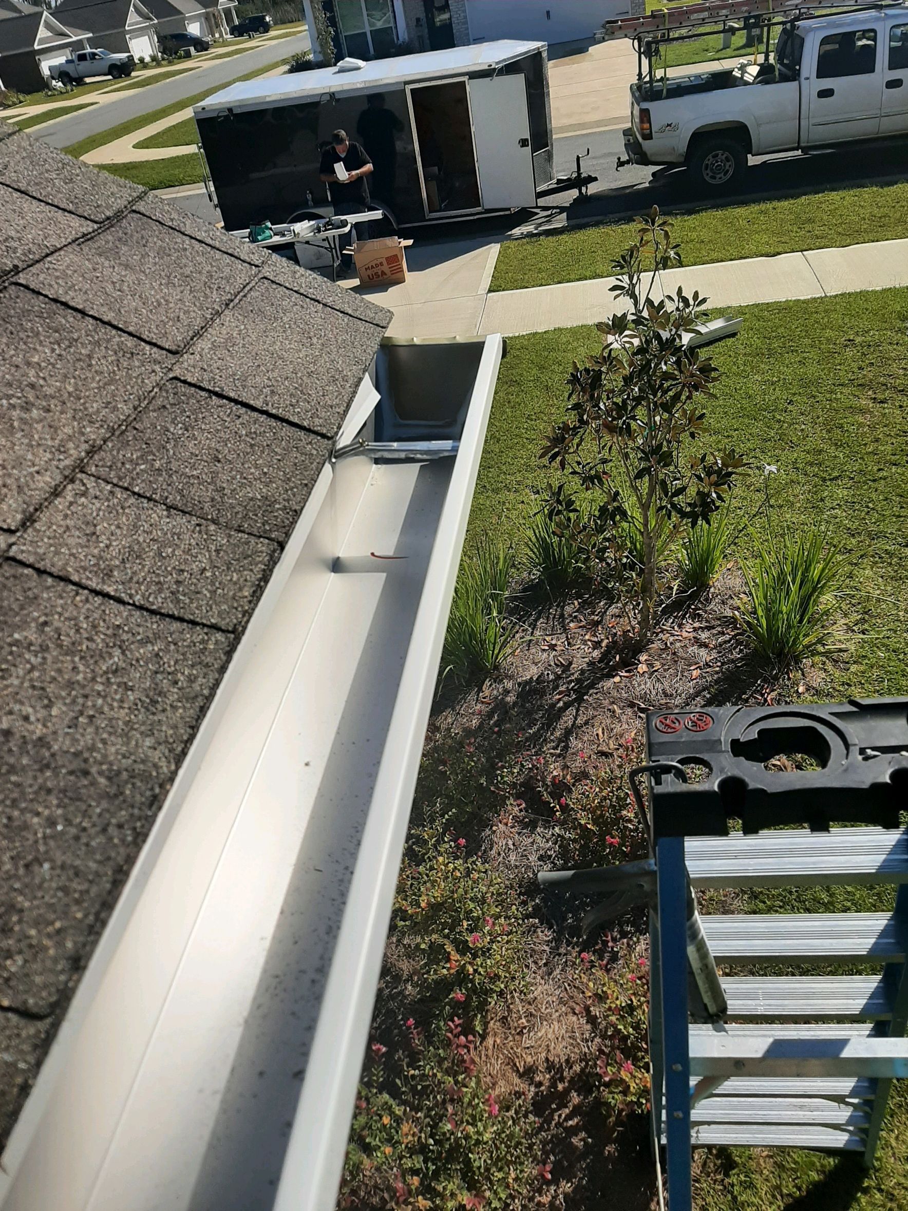 Seamless Gutter Installation using White K-Style Gutters by Gutter Professors