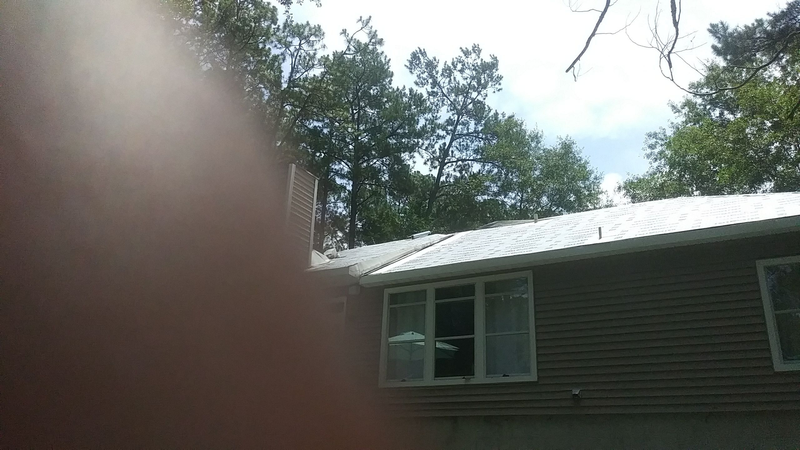 Residential Roofing Installation using Roof Replacement by American Roofing & Construction LLC