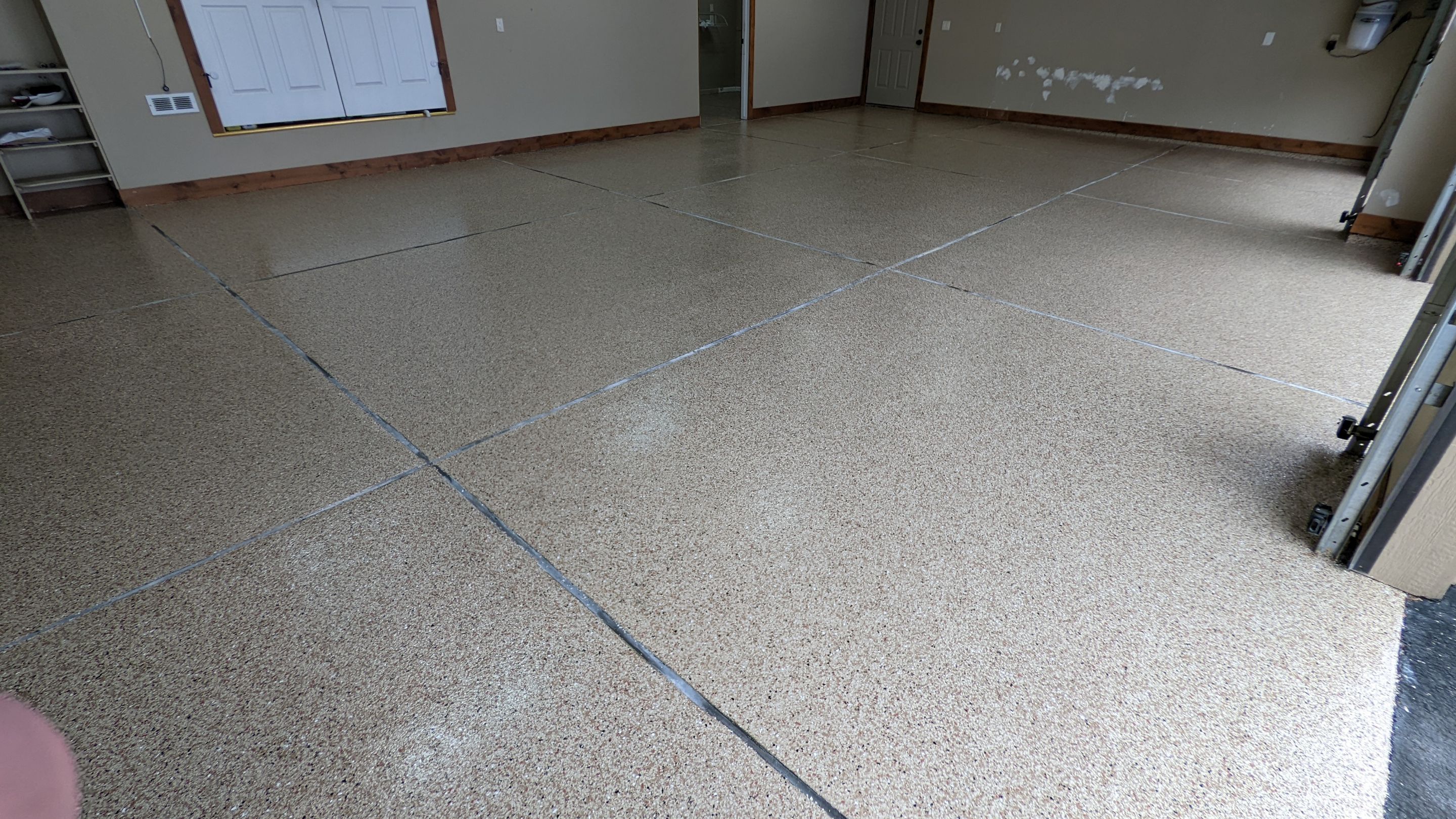 Garage Transformation using Sandstone by Croc Coatings, LLC