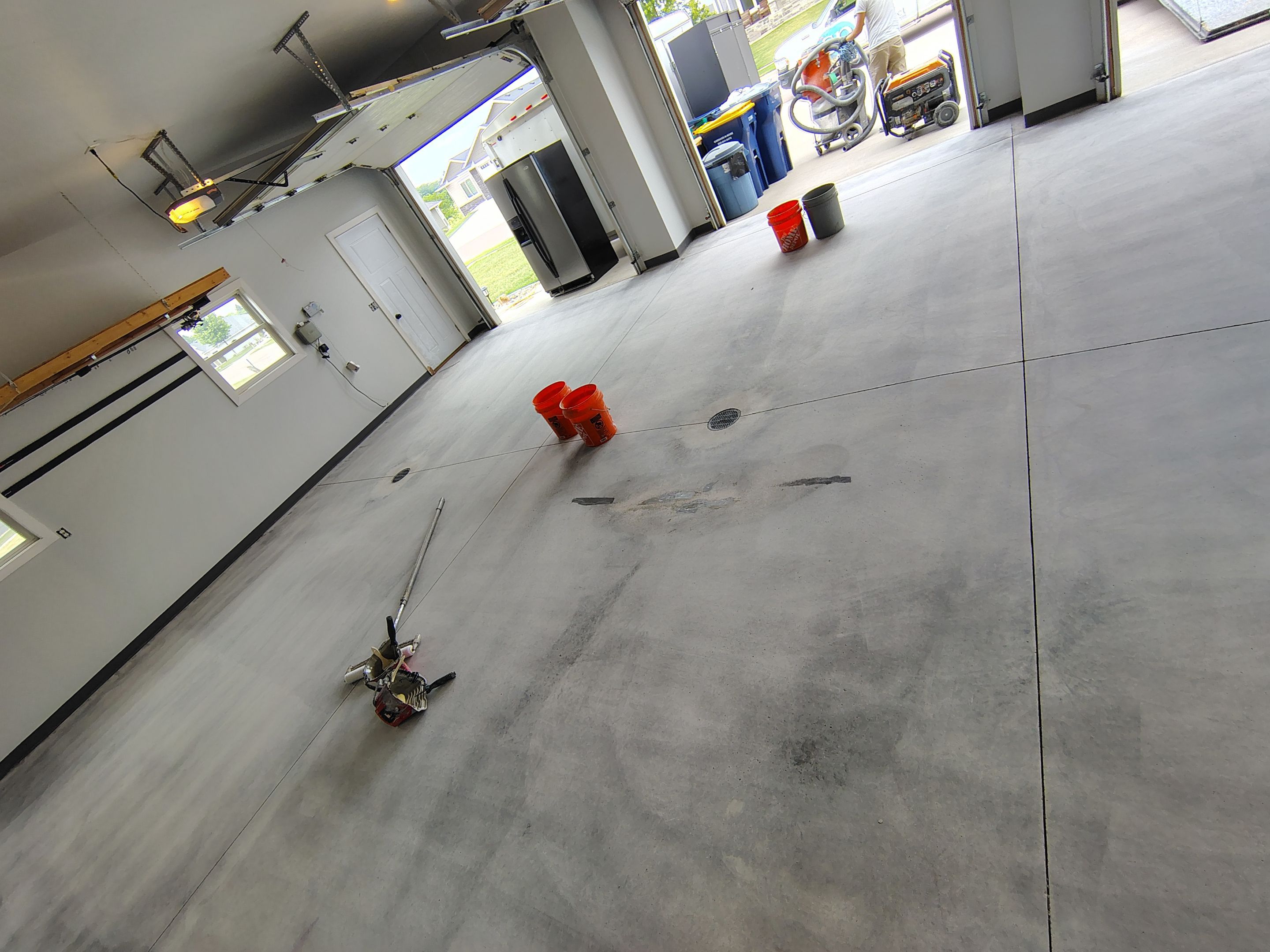 Multi-Car Garage Concrete Coating and Crack Repair in Dell Rapids by Select Painting, Coatings & Garage Cabinets