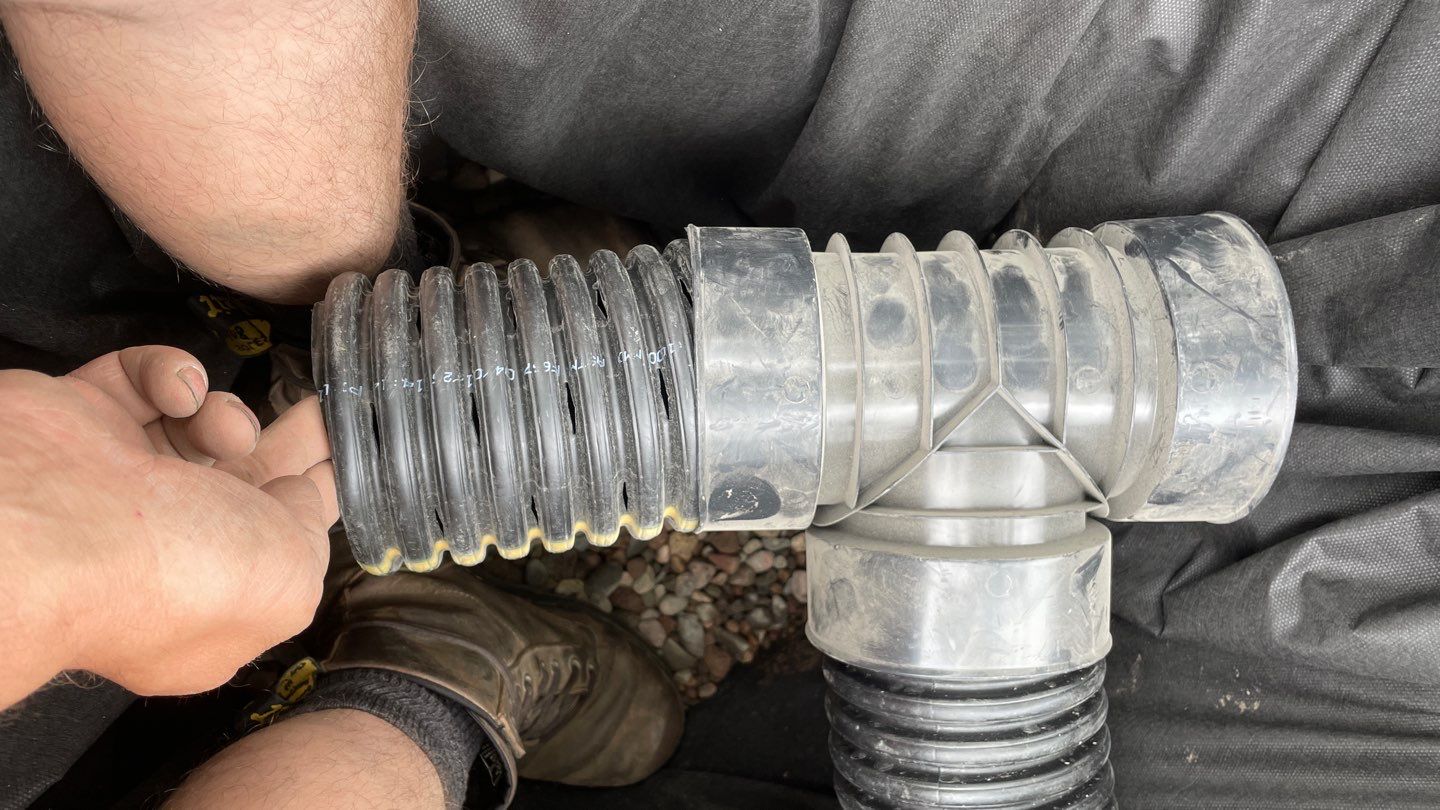 Richard’s Sump Pump Discharge Line Fix by Waterproofing Northeast
