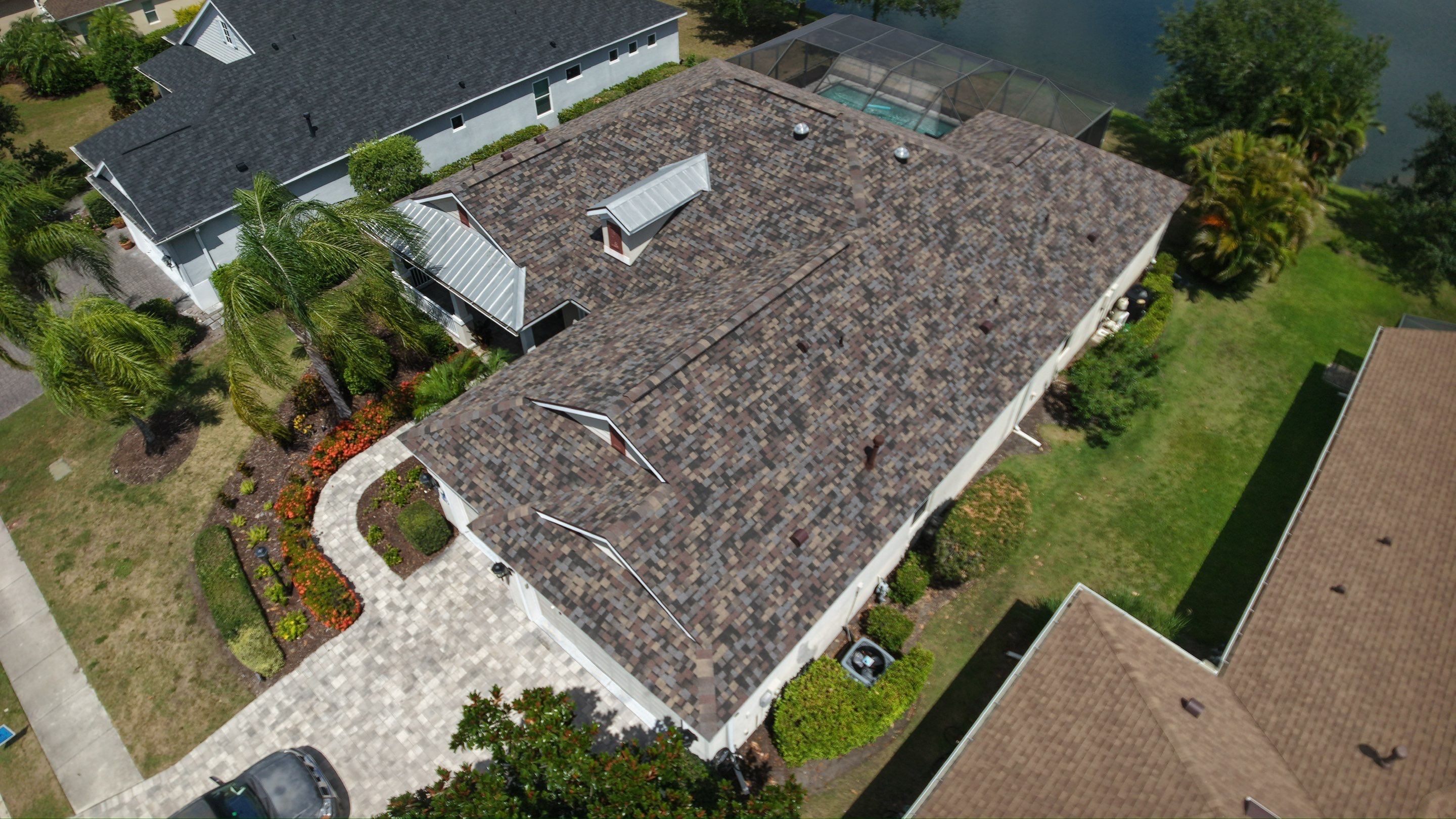 Architectural Summer Harvest Asphalt Shingle Roof Replacement in Bradenton, Florida by Trinity Restoration and Roofing LLC