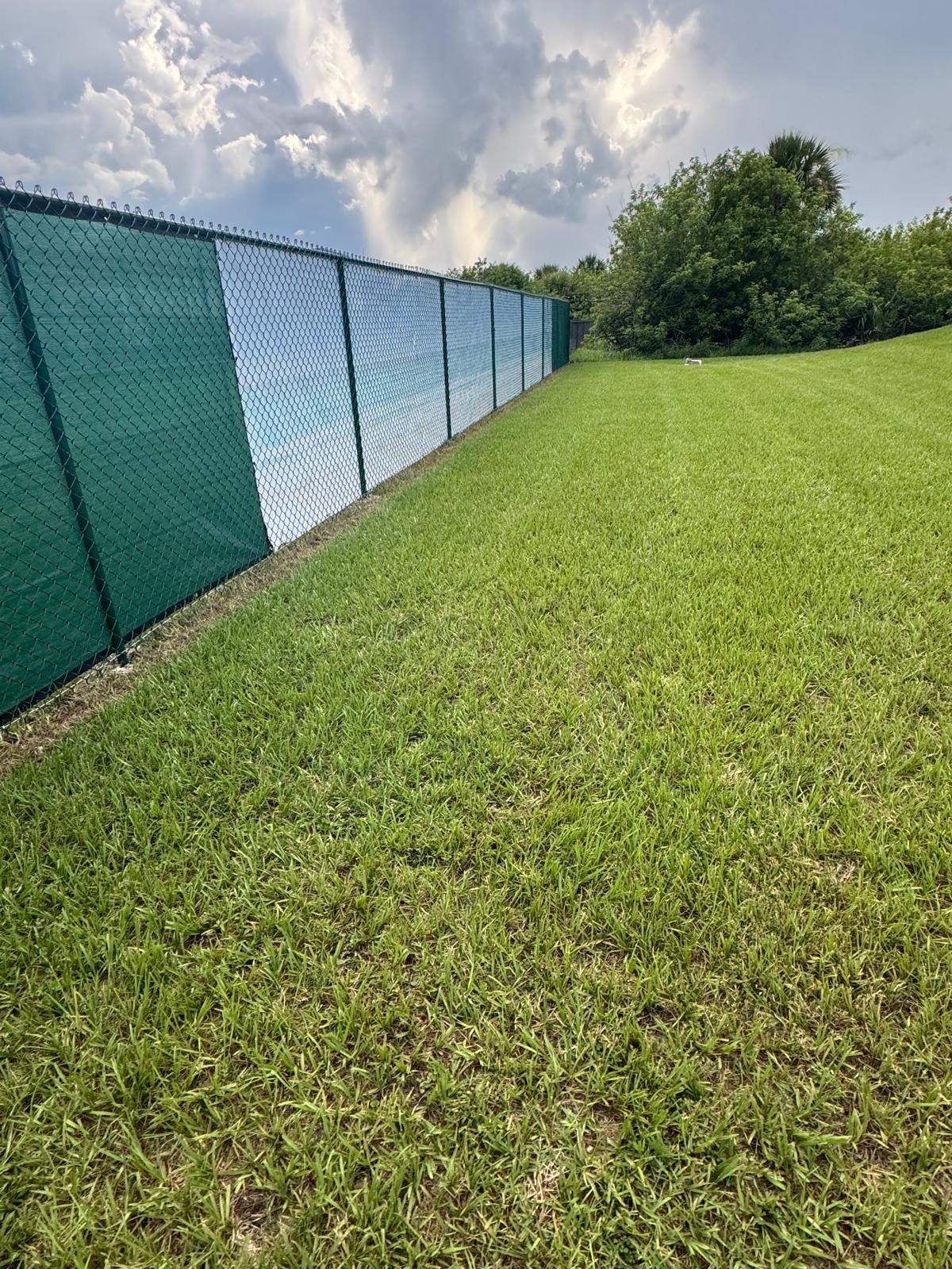 Chain Link Fence Installation with Custom Beach Privacy Screen in Port Charlotte by True Fence LLC
